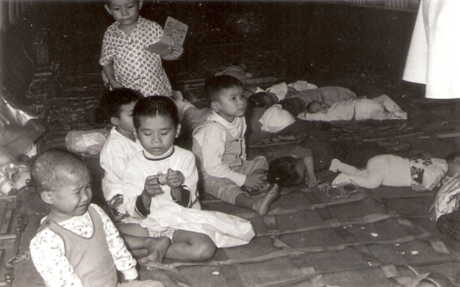 Vietnamese babies and children are loaded on board one of the evacuation flights from Saigon.