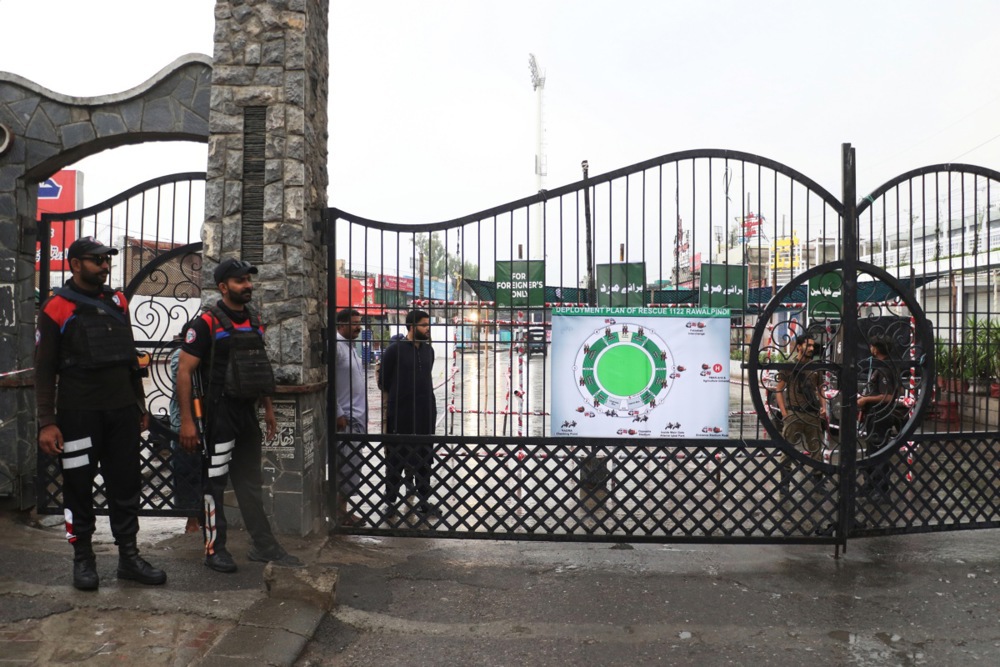 epa12083005 Pakistani security officials stand guard at the Rawalpindi Cricket Stadium after a drone strike, allegedly by India, in Rawalpindi, Pakistan, 08 May 2025. The Pakistani military reported that Indian drone attacks have resulted in the death of at least one civilian and injuries to four soldiers across multiple locations in Pakistan, including Lahore and Karachi. Military spokesperson Lt Gen Ahmed Sharif stated that Pakistan's armed forces neutralized 12 Indian Harop drones during the assault. This comes in the wake of previous airstrikes by India, which Pakistan claims resulted in 31 civilian deaths. The ongoing conflict has heightened since an attack in April that killed 26 civilians in Indian-administered Kashmir. EPA-EFE/SOHAIL SHAHZAD