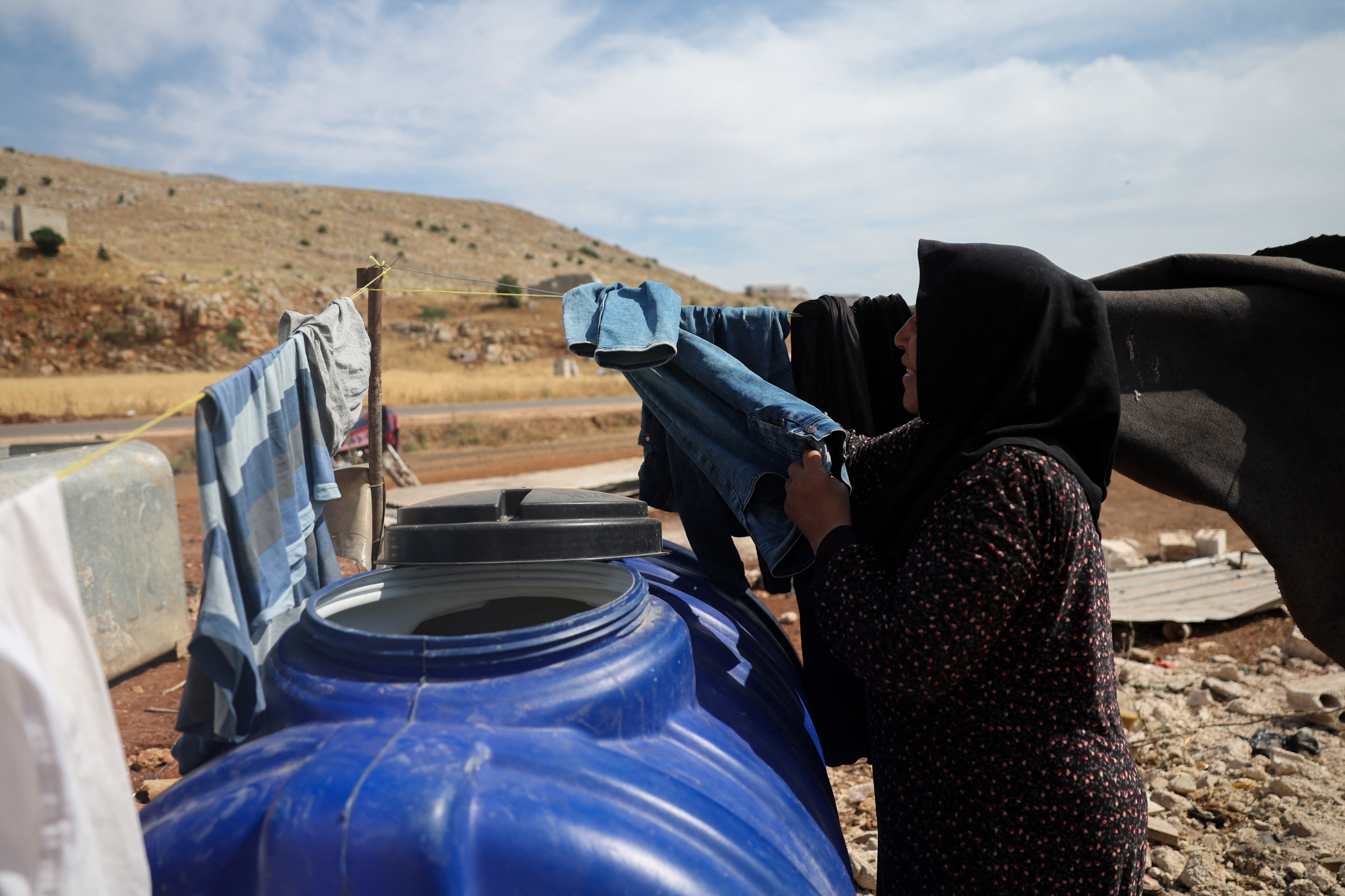 Syrians return to villages destroyed by war, defying displacement camps