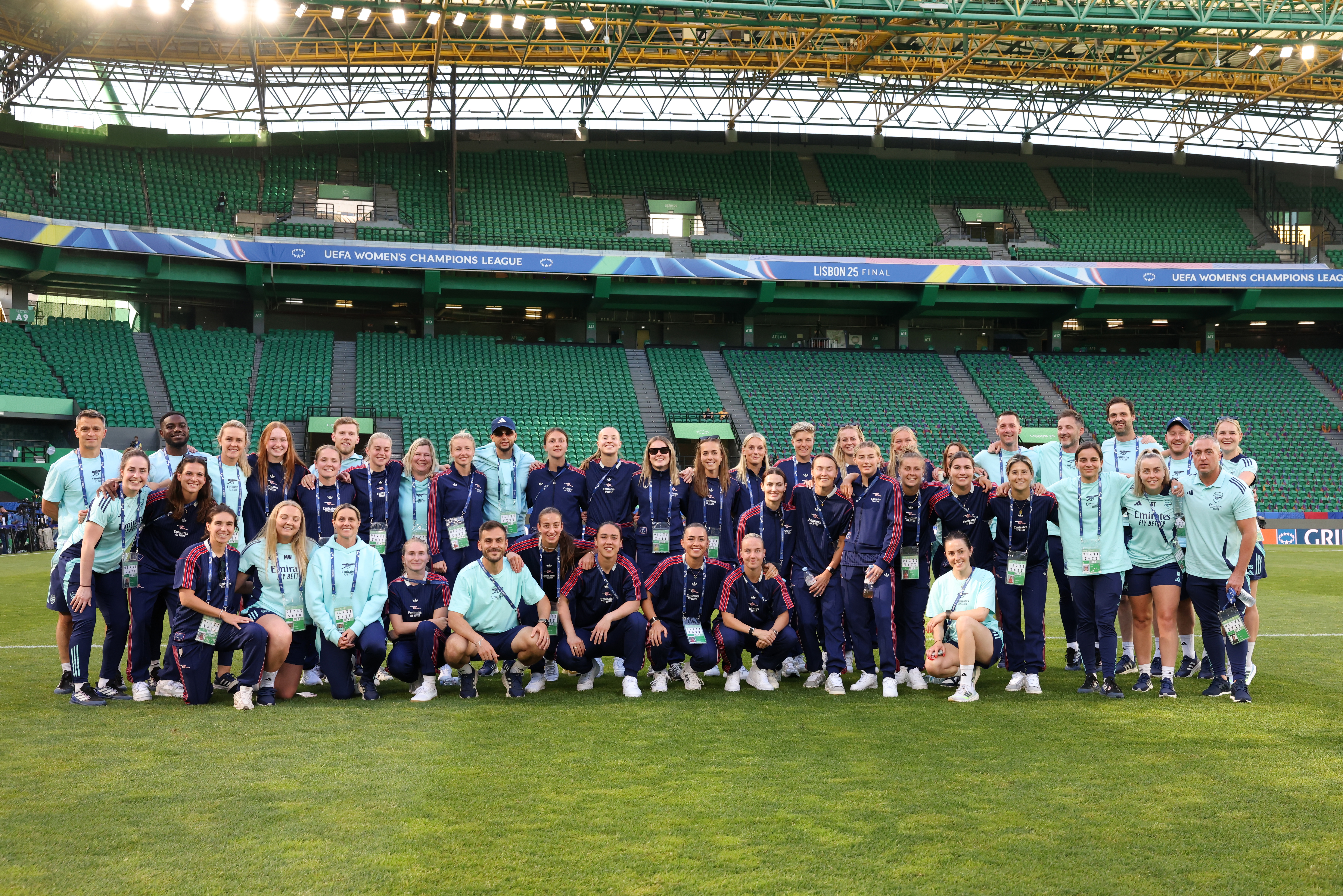 Players and staff of Arsenal pose for a photo ahead of the UEFA Women's Champions League Final 2025 against Barcelona
