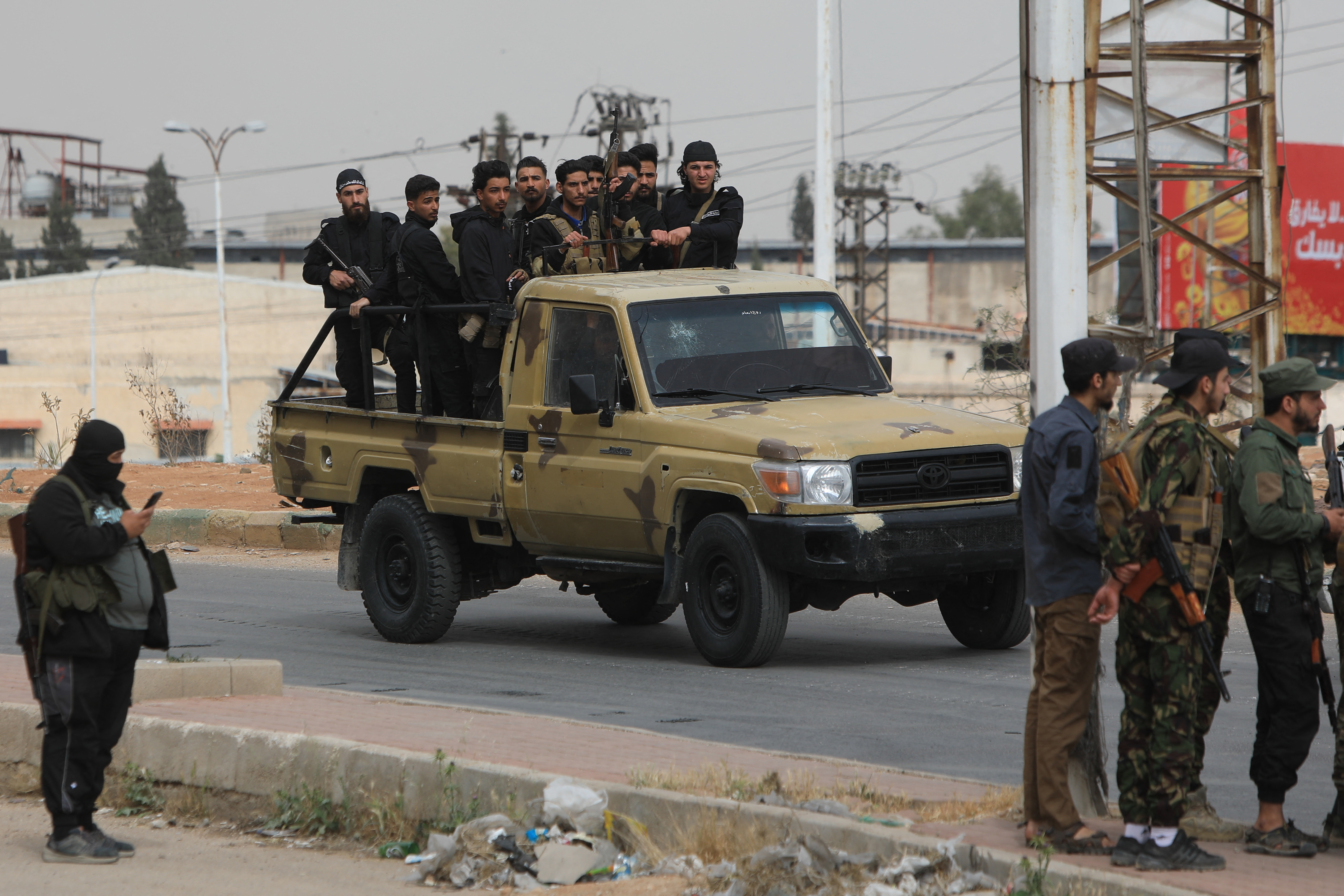 Members of Syria's security forces deploy in an area near the Syrian capital Damascus on April 30, 2025, amid deadly sectarian clashes.