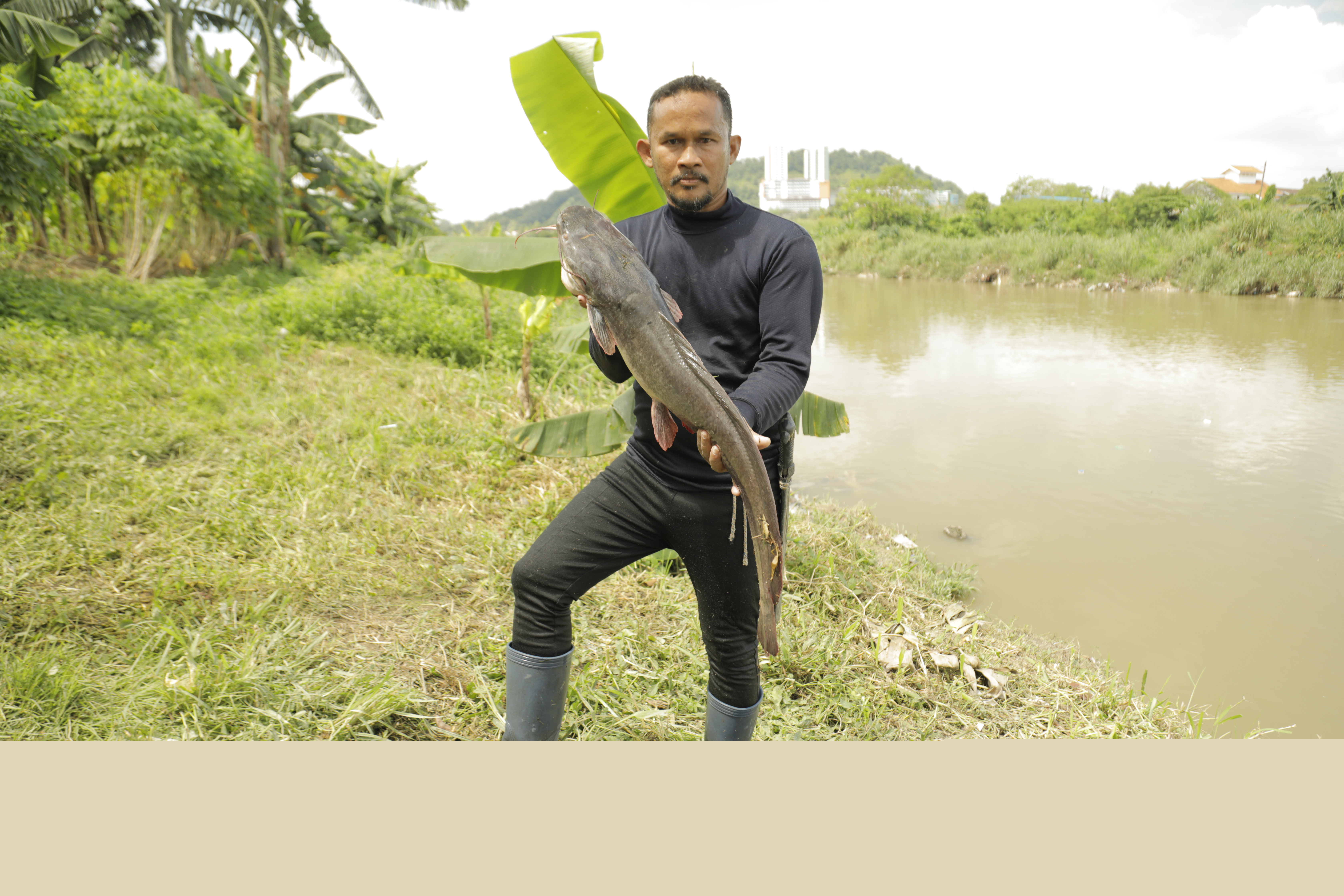 Man holding a large fish.