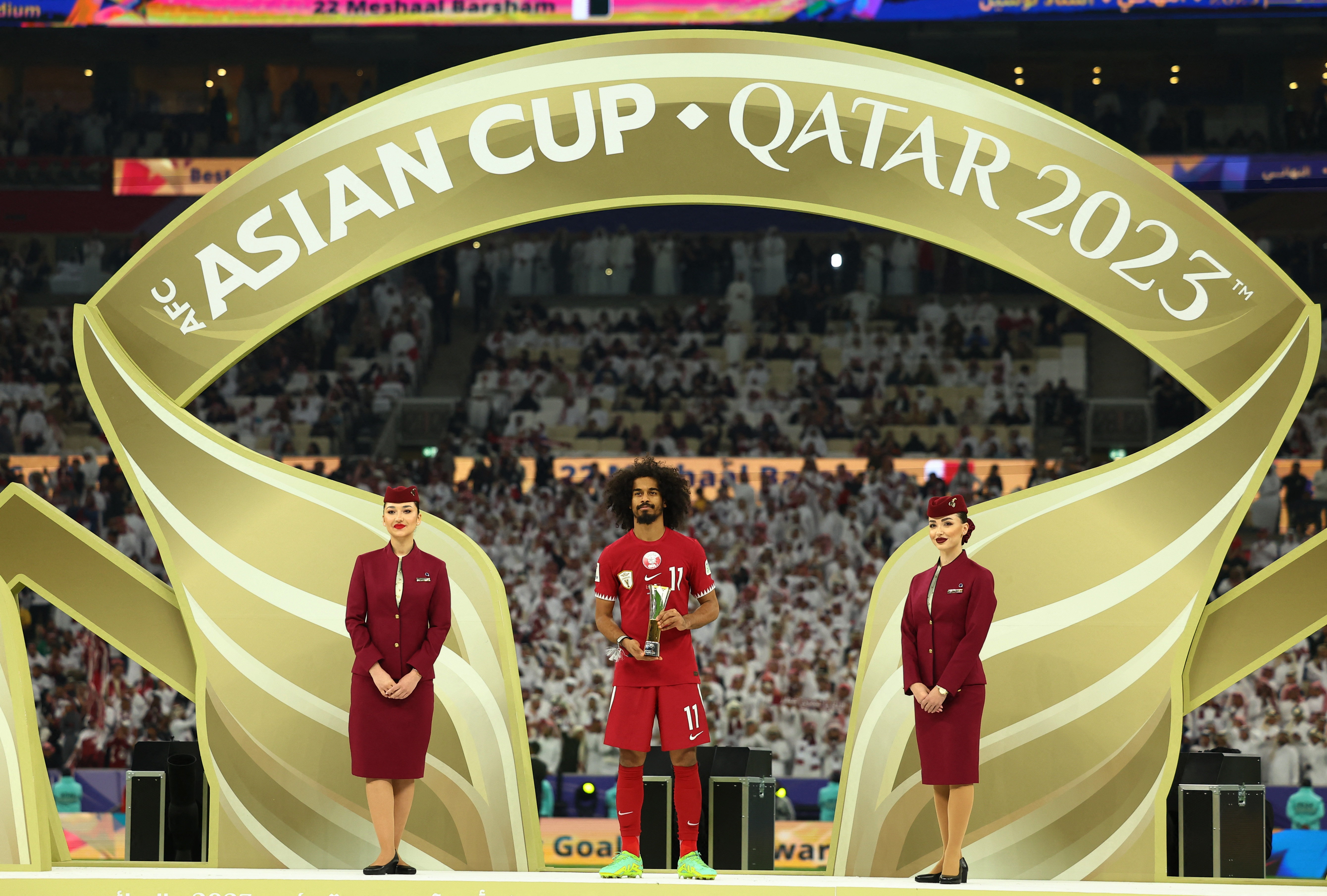 AFC Asian Cup - Final - Jordan v Qatar - Lusail Stadium, Lusail, Qatar - February 10, 2024 Qatar's Akram Afif celebrates with the trophy for player of the tournament 