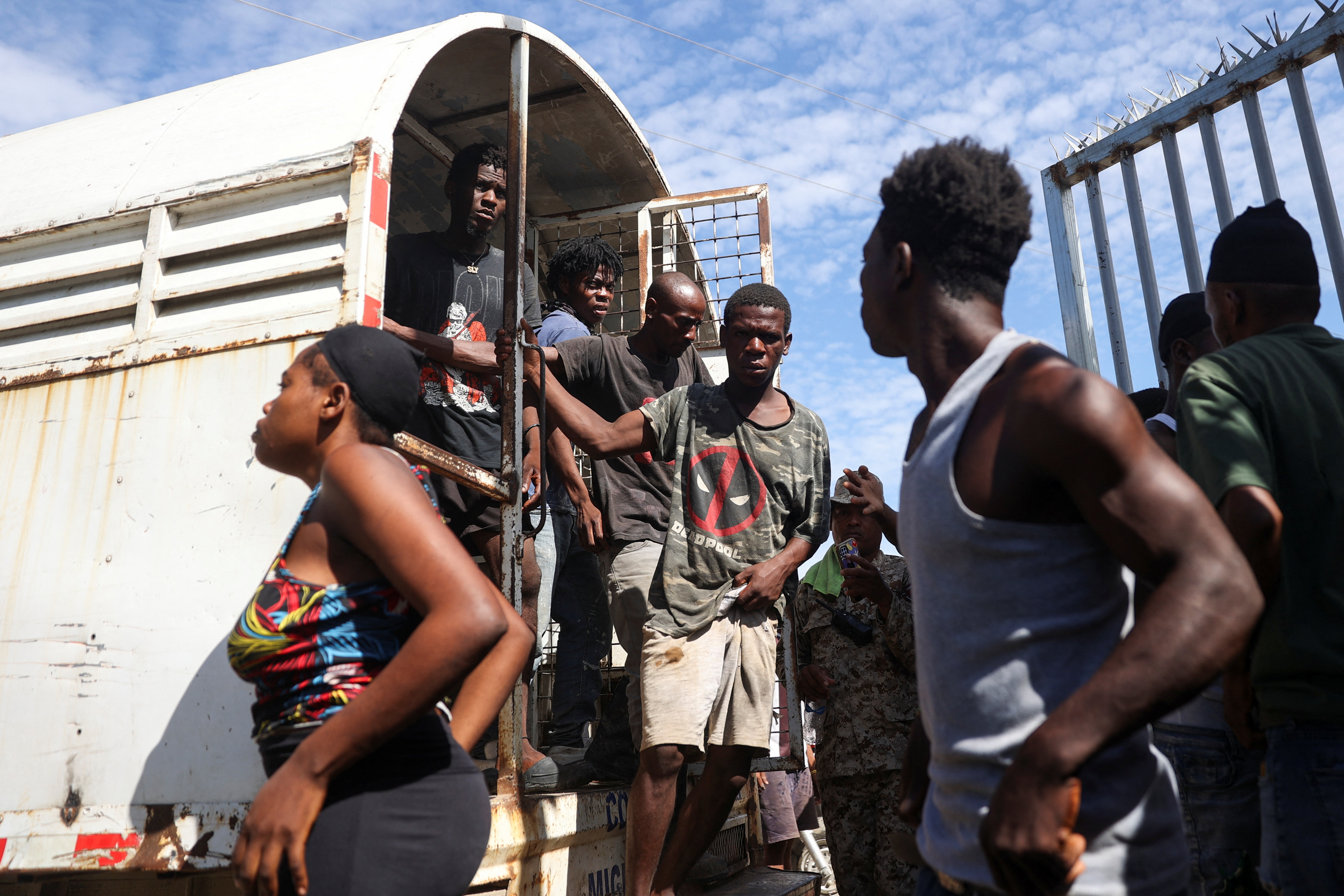 Haitian refugees and migrants arrive at the border between the Dominican Republic and Haiti, following the announcement that the Dominican Republic will deport up to 10,000 undocumented migrants per week, in Elias Pina, Dominican Republic, October 14, 2024 [Erika Santelices/Reuters]