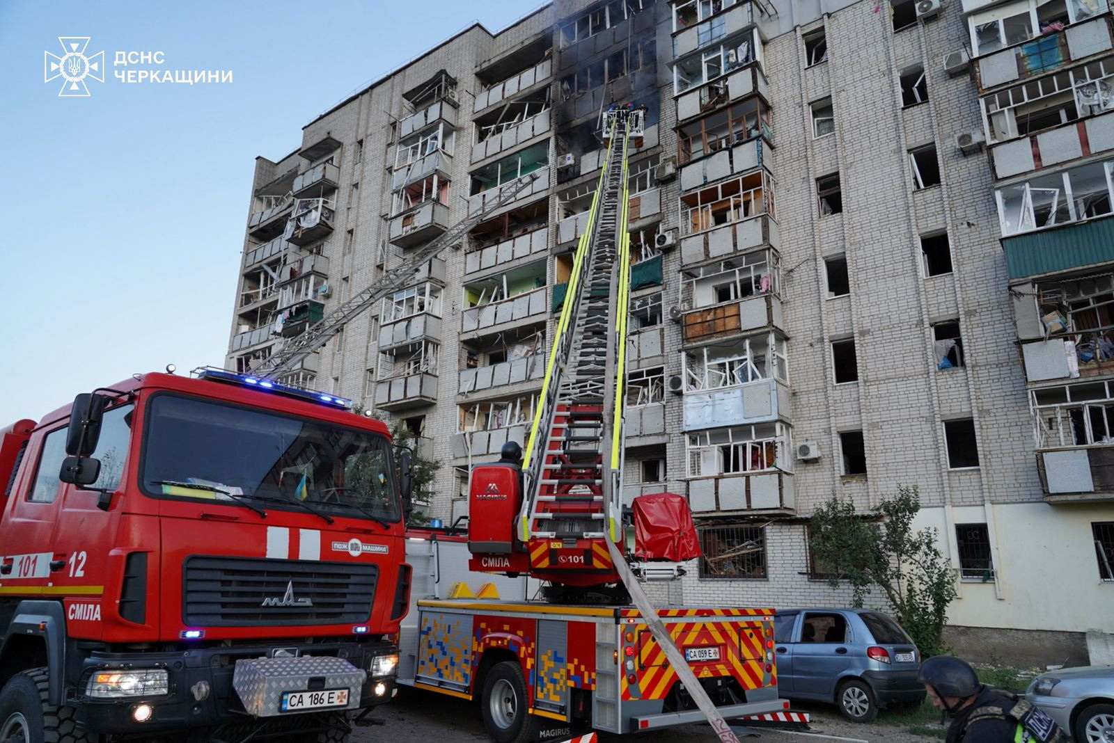 Firefighters at the site of an apartment building damaged during Russian drone and missile strikes in Smila, Cherkasy region, Ukraine