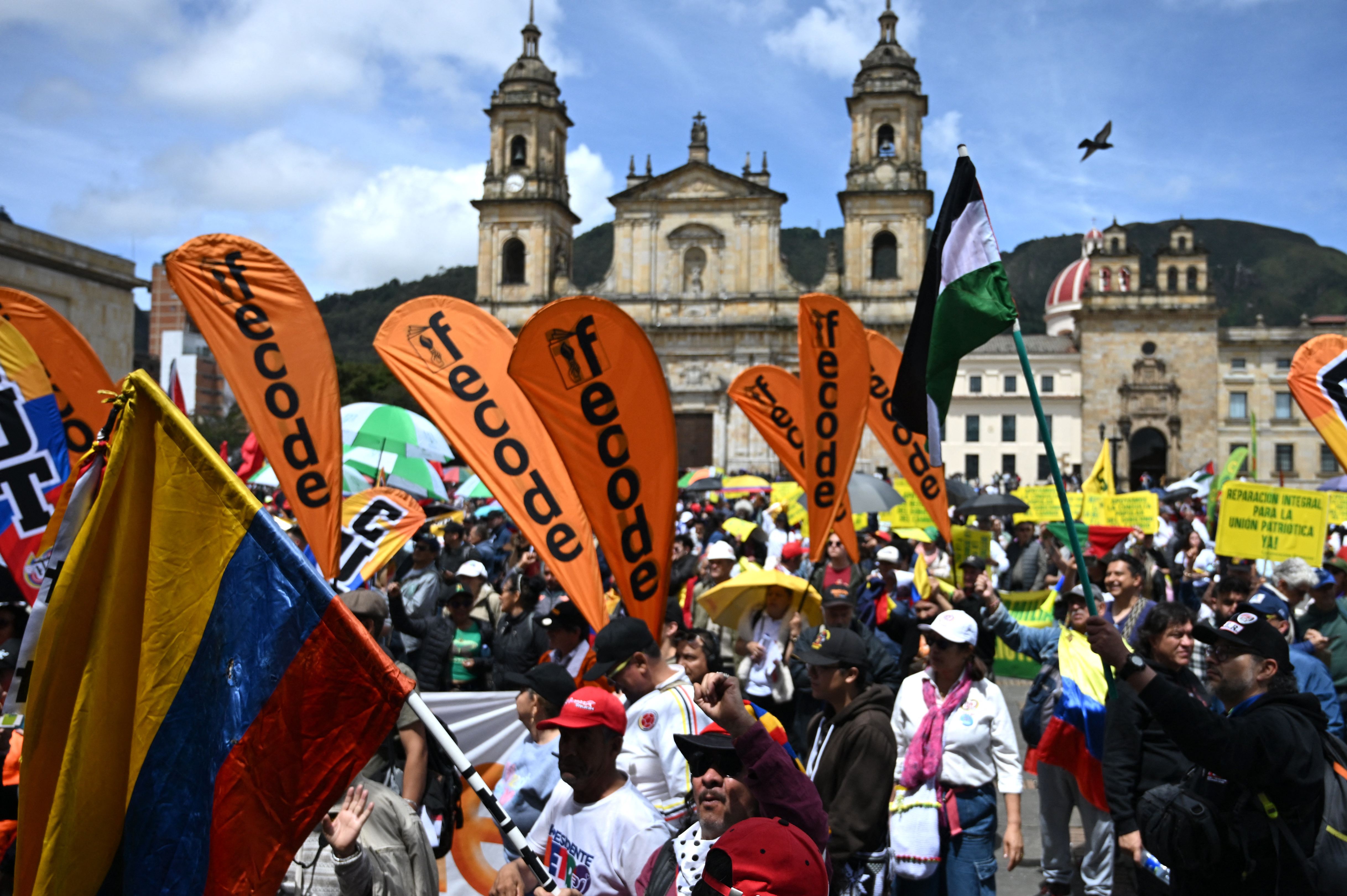Members of trade unions, student organisations, social groups and community organisations participate in a march in support of the referendum and social reforms proposed by the government of Colombia's President Gustavo Petro in Bogota on June 11, 2025.