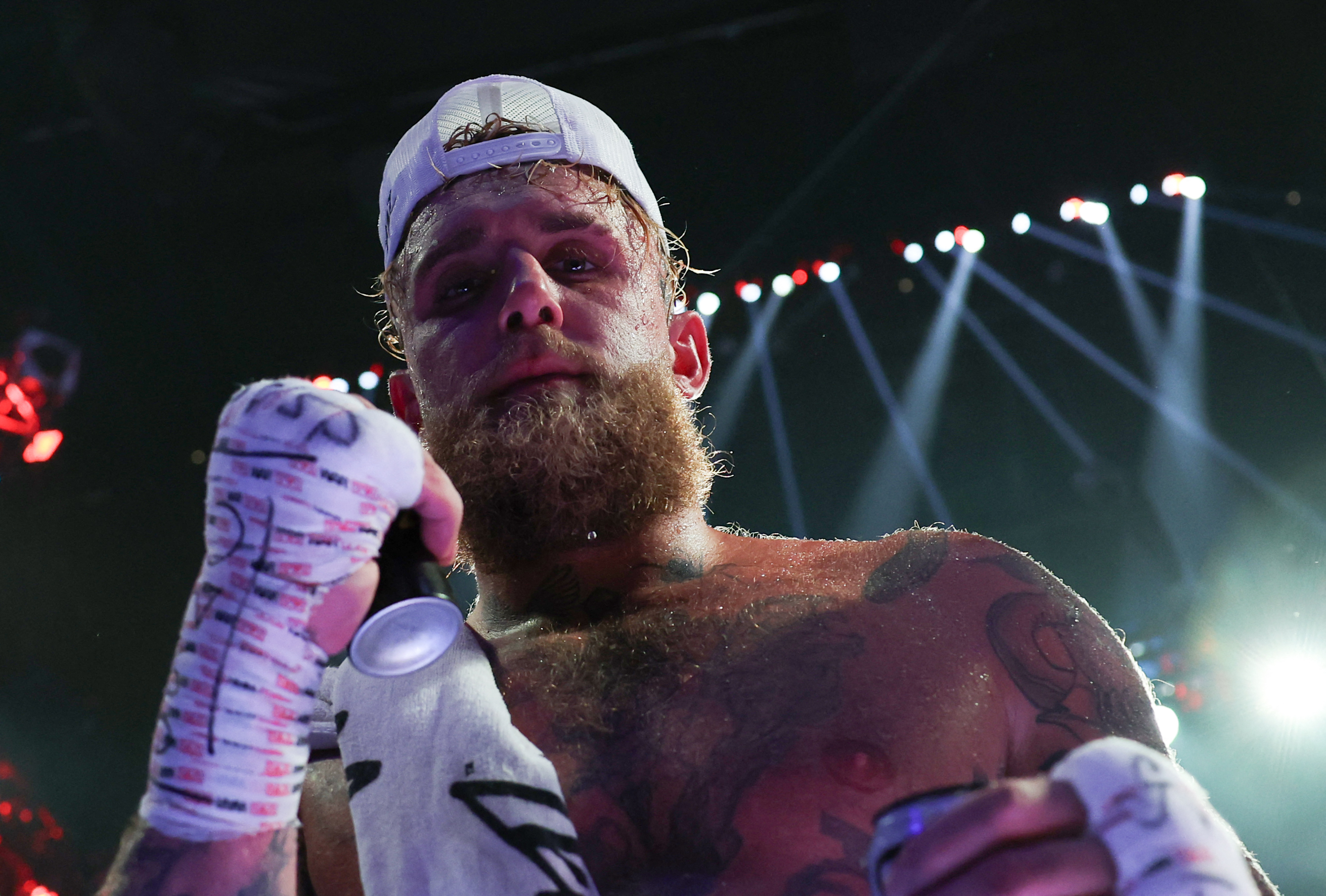 USA's Jake Paul celebrates winning the cruiserweight boxing bout against Mexico's Julio Cesar Chavez Jr. at the Honda Center in Anaheim, California, on June 28, 2025. (Photo by Patrick T. Fallon / AFP)