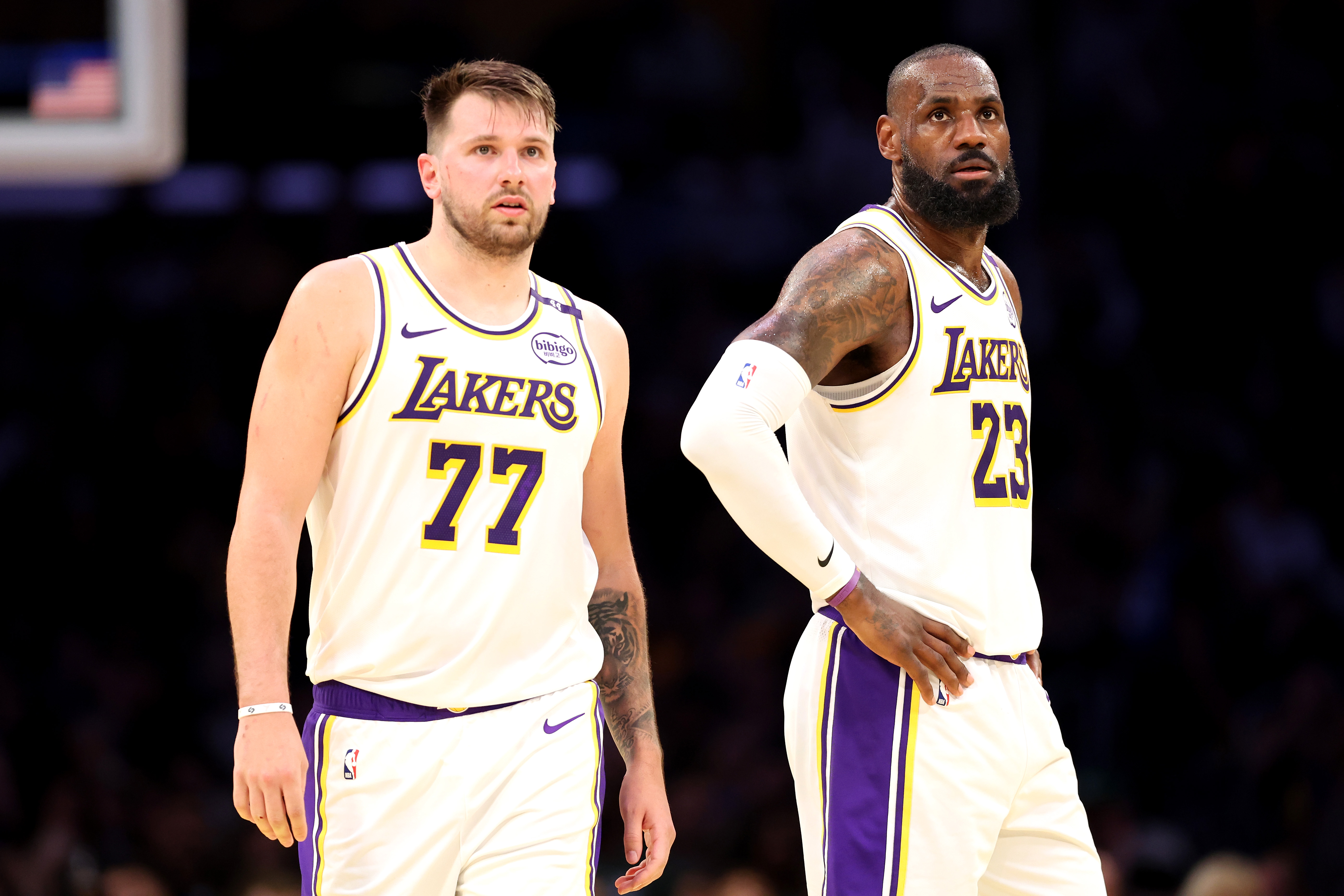 Luka Doncic and LeBron James react.