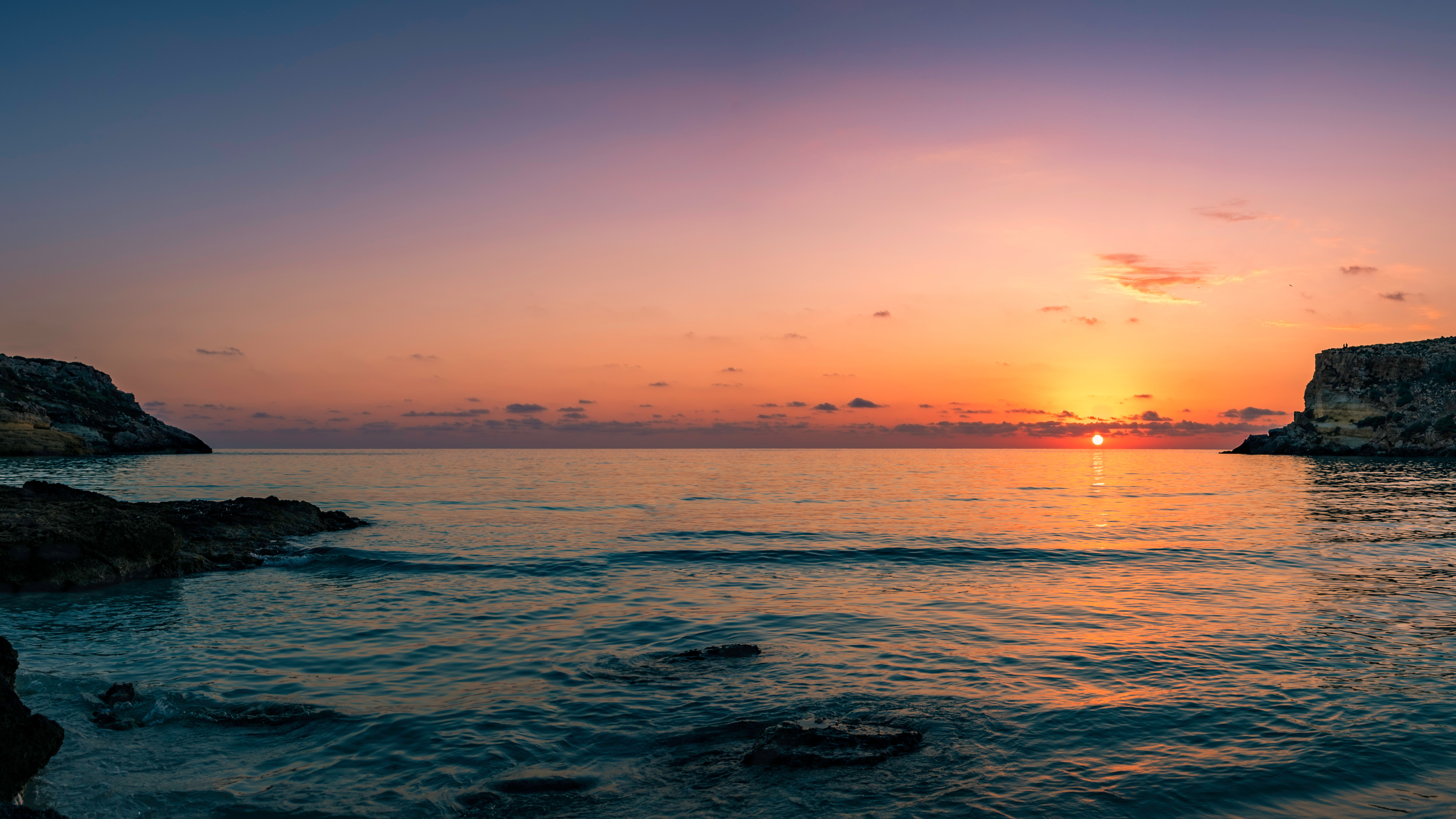 Sunset over the rabbit beach in Lampedusa - a little island next to Africa, considered to be one of the best beaches on Earth. Its serenity and wilderness are truly remarkable. Furthermore, it has been been chosen by the extinct loggerhead turtles to lay their eggs.
