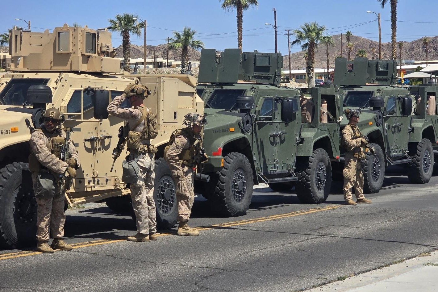 This handout photo released by US Northern Command on X (formerly Twitter) shows Marines with the 2nd Battalion, 7th Marines, preparing to depart from an undisloced location for the greater Los Angeles area on June 9, 2025.