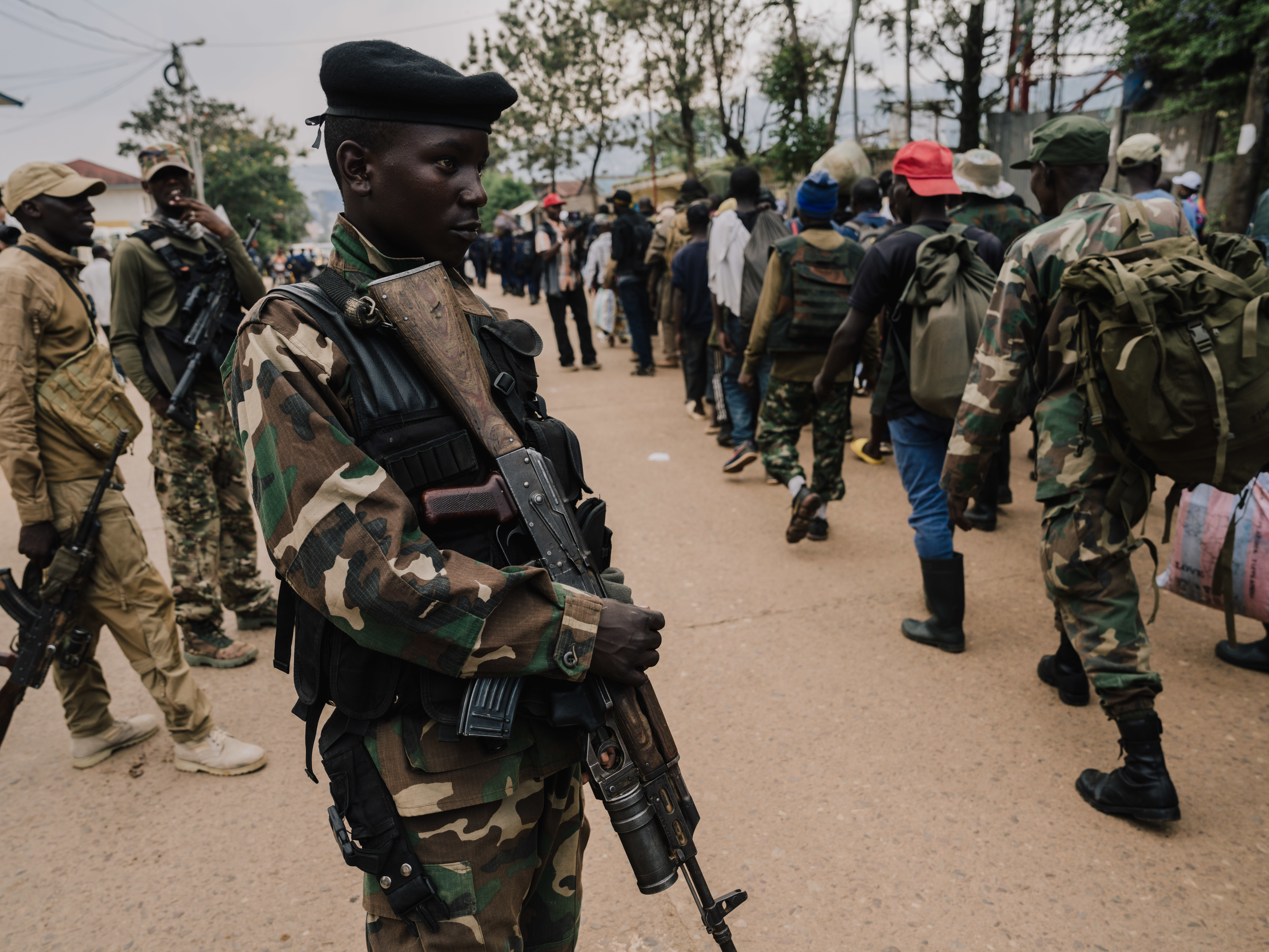 BUKAVU, DEMOCRATIC REPUBLIC OF CONGO - FEBRUARY 22: M23 rebels guard a unit of surrendering Congolese military troops who will be recruited into the rebel group on February 22, 2025 in Bukavu, Democratic Republic of Congo. The Rwandan-backed rebel group M23 swept into Bukavu over the weekend, taking control of the city with a population of approximately one million people in Democratic Republic of the Congo's (DRC) South Kivu Province. Hundreds of thousands of people in the eastern part of the DRC have been displaced as the rebel group has made swift advances against Congolese pro-government forces in recent weeks. (Photo by Hugh Kinsella Cunningham/Getty Images)