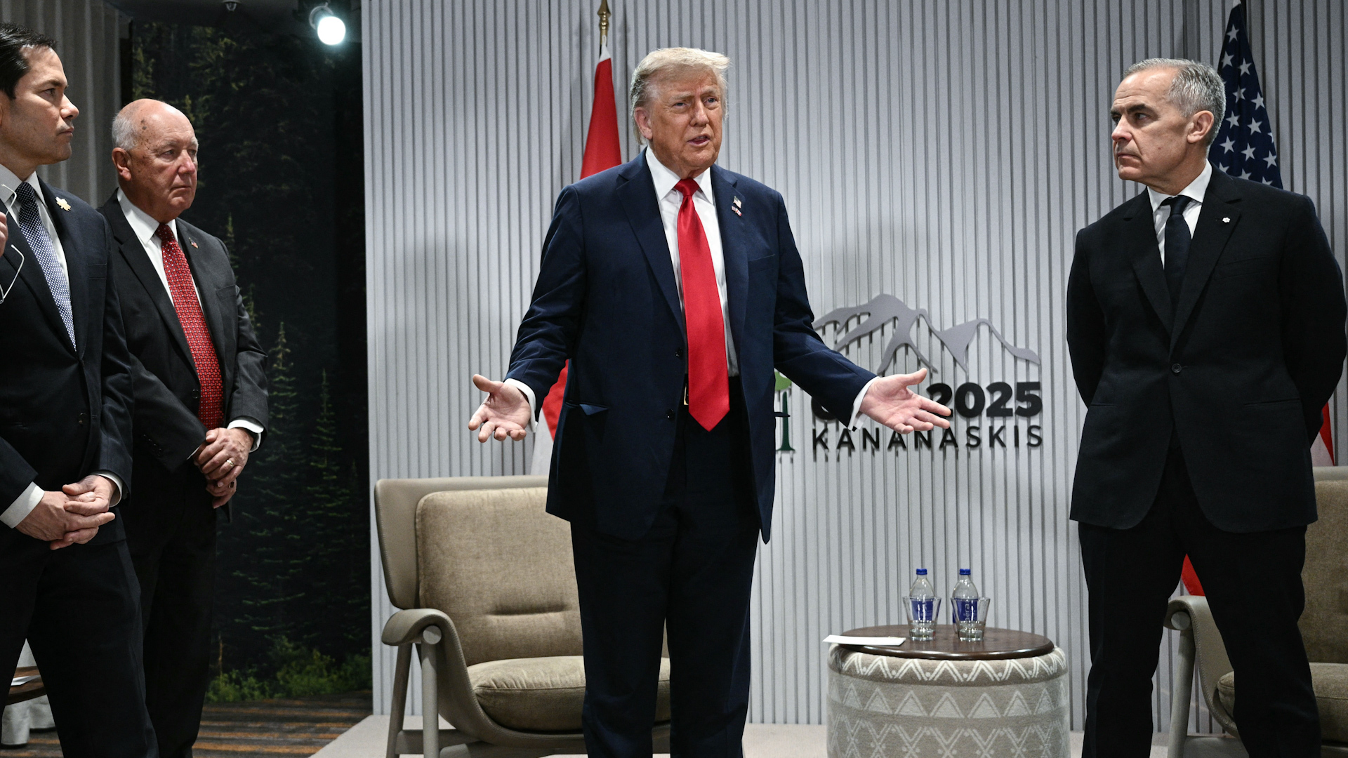 Trump gestures at G7 conference.