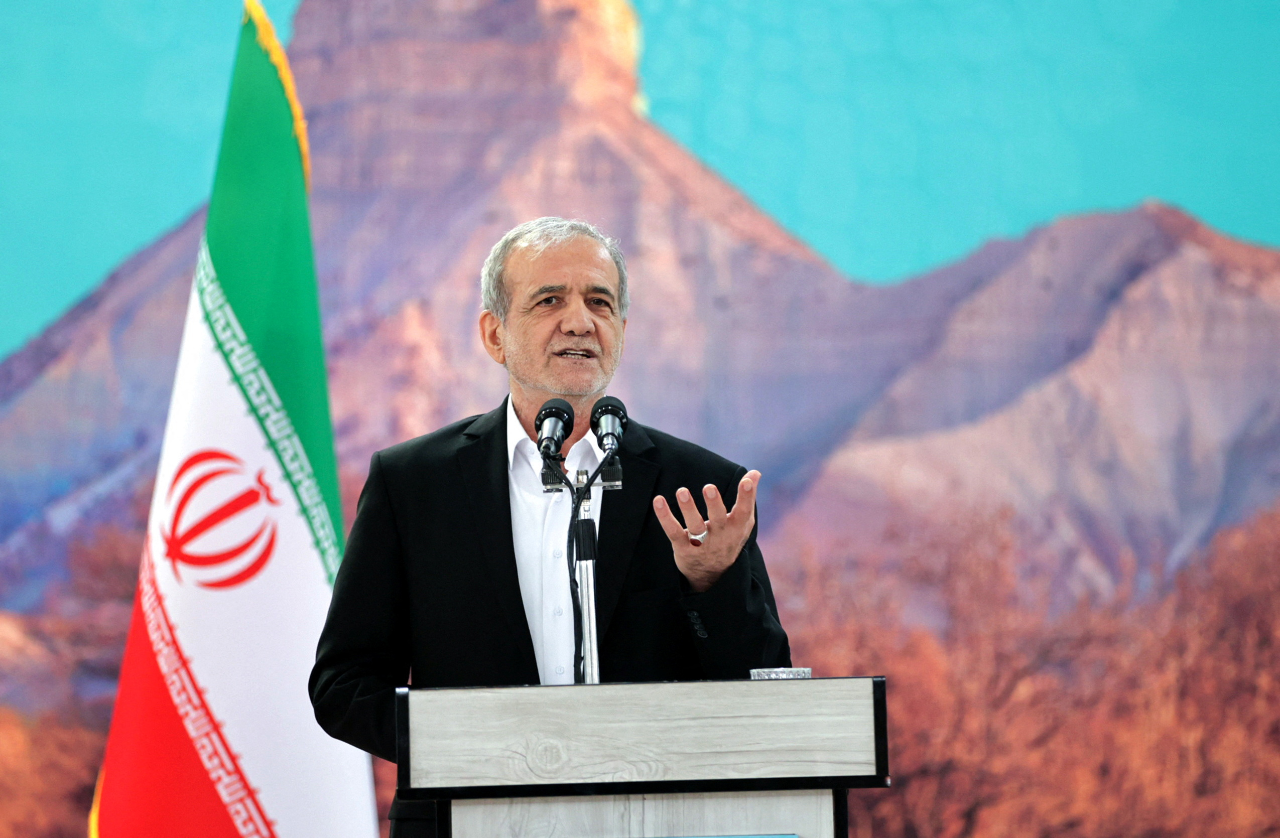 Iranian President Masoud Pezeshkian speaks.