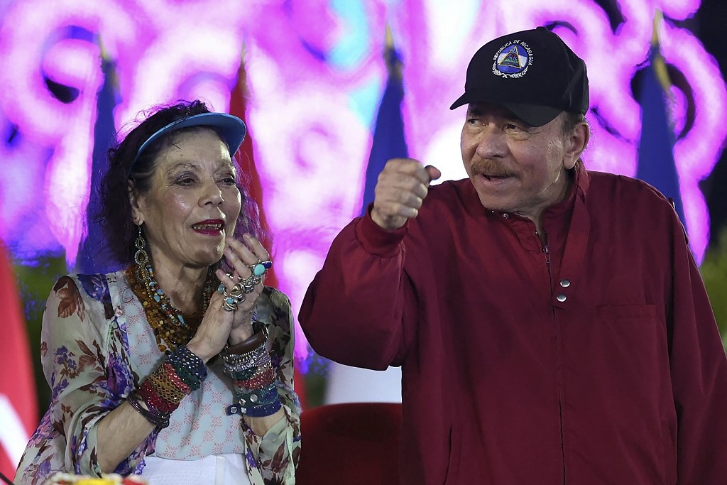 Nicaraguan President Daniel Ortega and Co-President Rosario Murillo gesturing during Labor Day celebrations in Managua on 30 April, 2025. [File: Jairo Cajina/AFP]