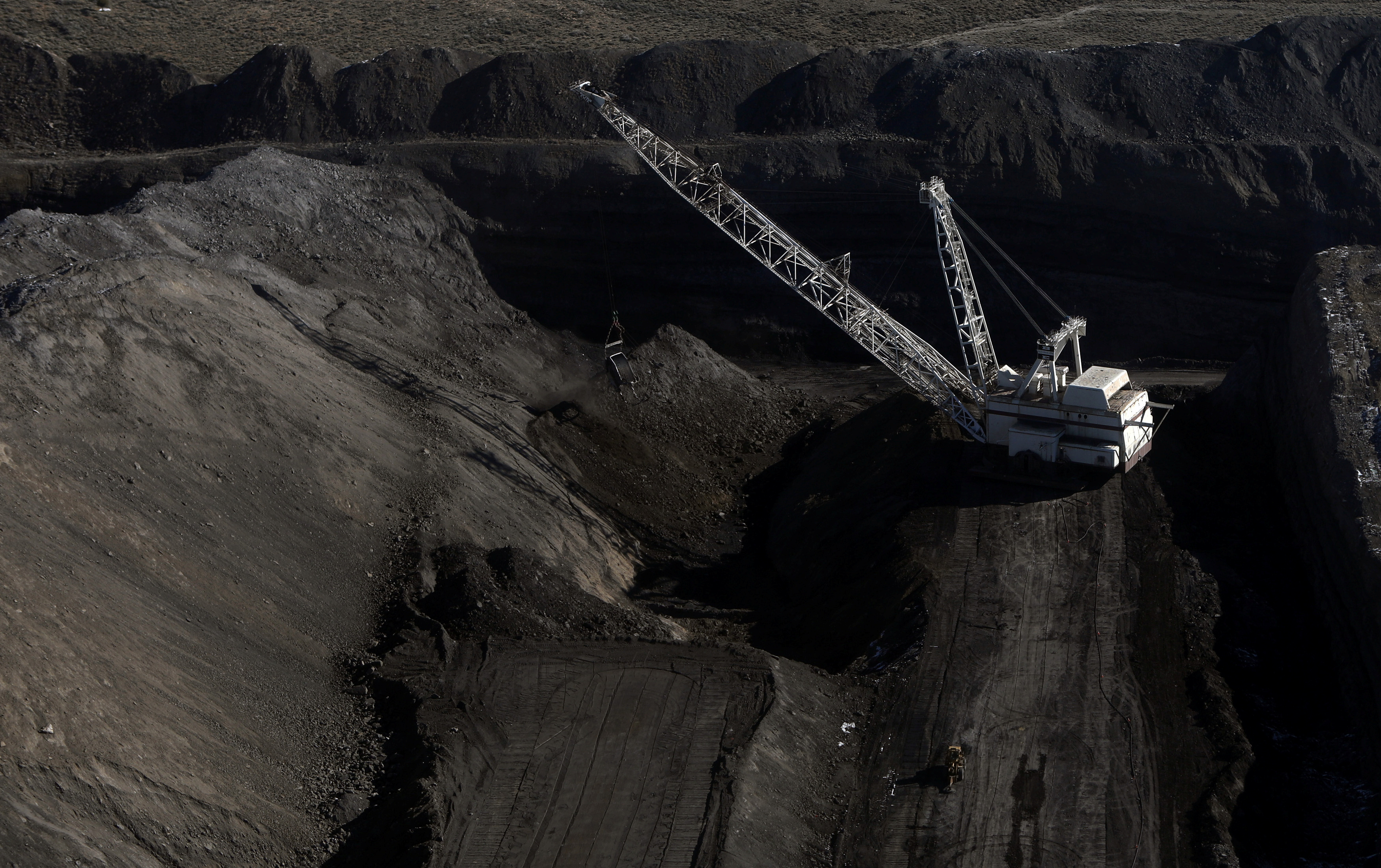 A dragline — a construction rig with a long arm — digs at the Black Butte coal mine.
