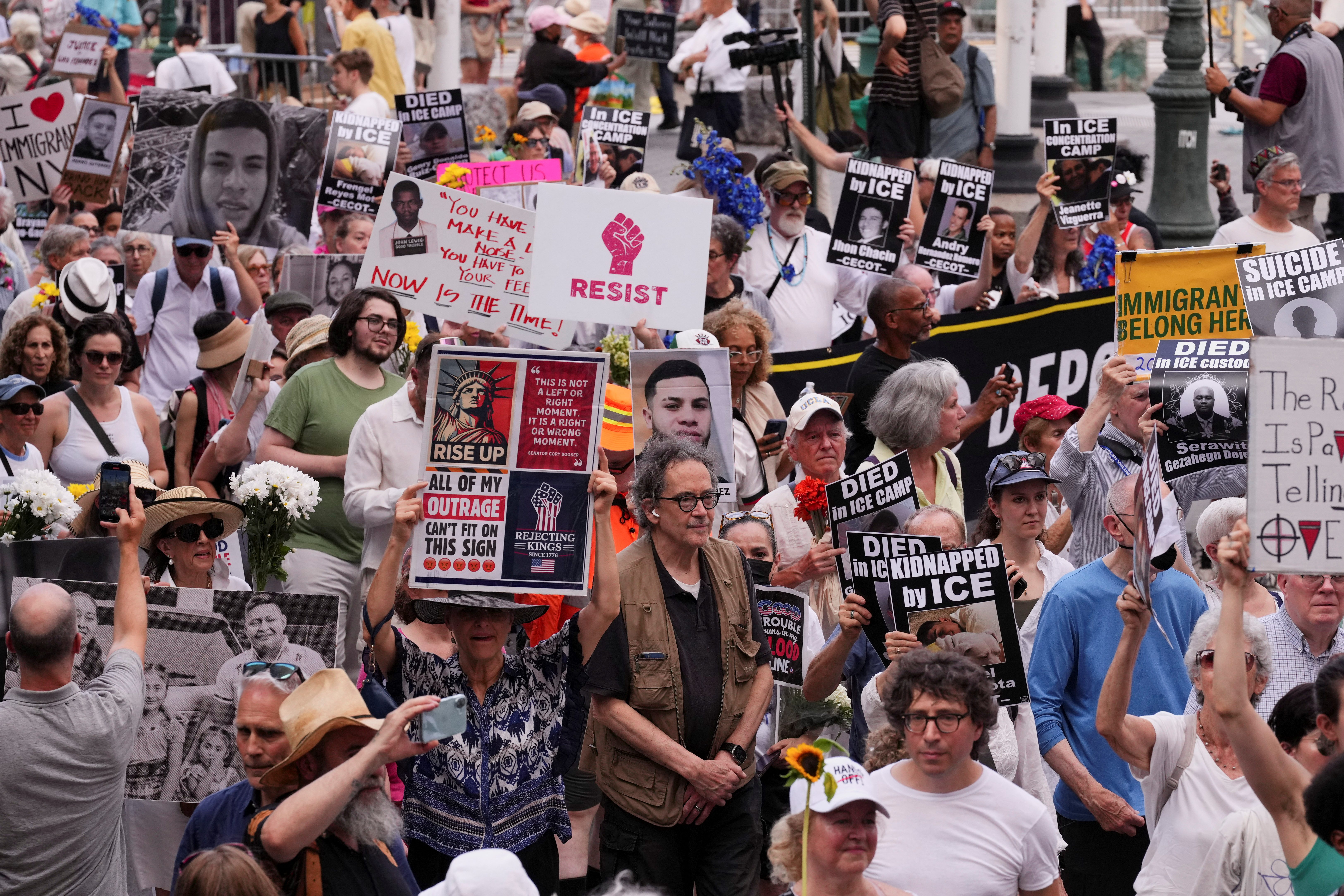People take part in a "Good Trouble Lives On" protest against U.S. President Donald Trump