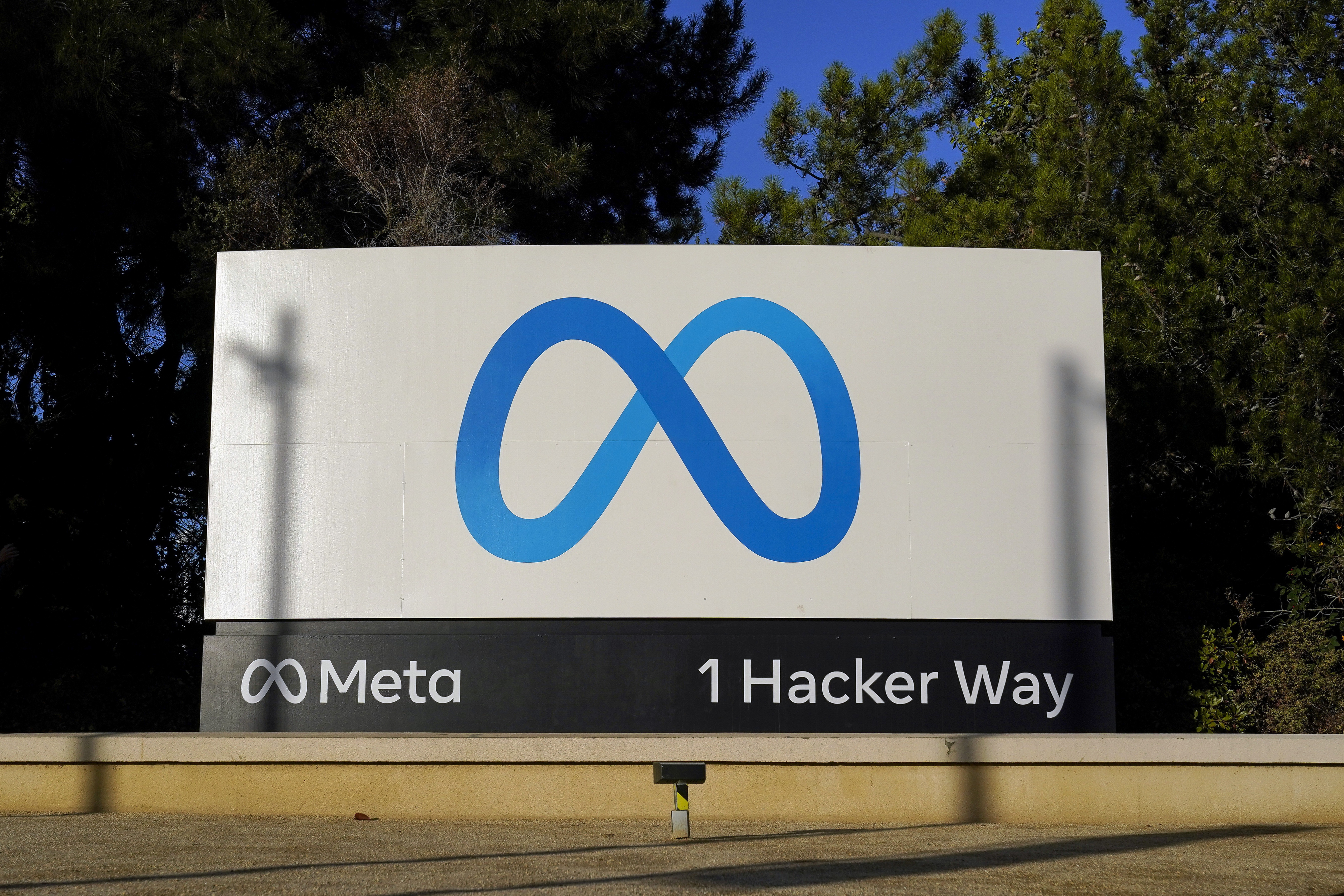 FILE - Meta's logo is seen on a sign at the company's headquarters in Menlo Park, Calif., Nov. 9, 2022. Meta has agreed to a $1.4 billion settlement with Texas in a privacy lawsuit over claims that the tech giant used biometric data of users without their permission, state officials said Tuesday, July 30, 2024. (AP Photo/Godofredo A. Vásquez, File)