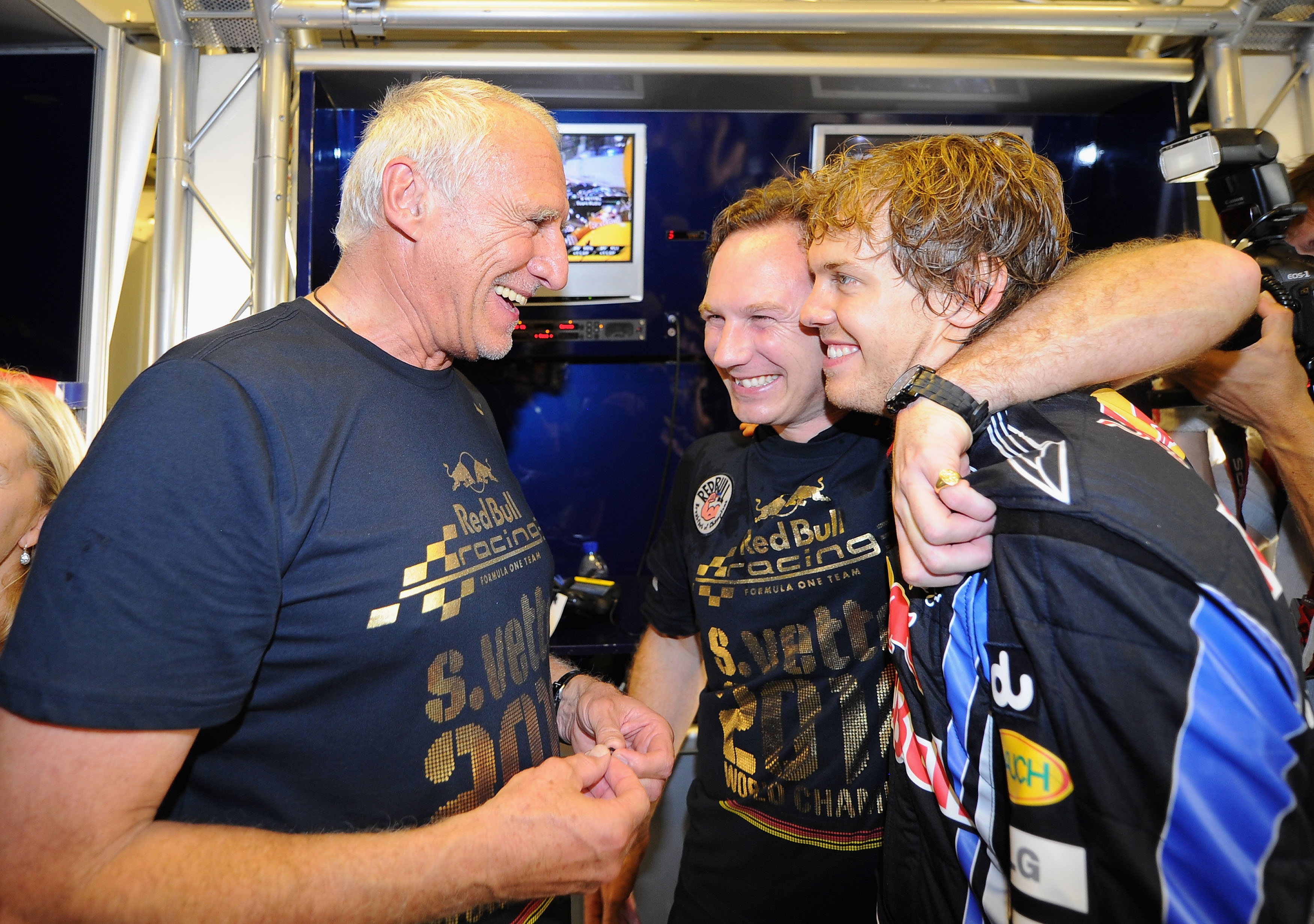 Dietrich Mateschitz, Christian Horner and Sebastian Vettel react.