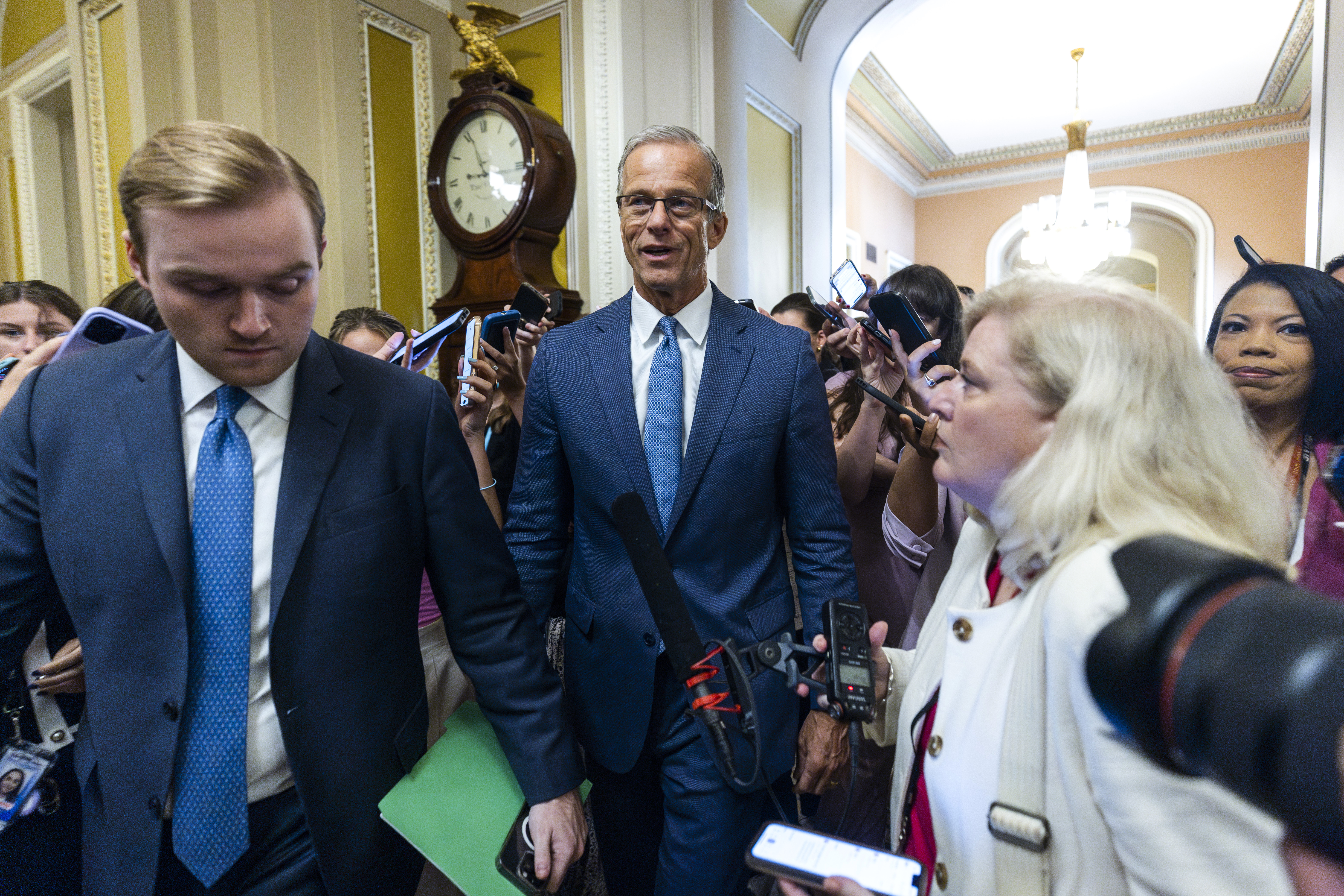 epa12208583 Republican Senate Majority Leader John Thune (C) speaks to reporters about the so-called 'Big, beautiful bill' in the US Capitol in Washington, DC, USA, 01 July 2025. Thune said he hopes to have a deal for the bill's passage in the Senate later in the day. According to the Congressional Budget Office, the bill will add nearly 3.3 trillion dollars to the US national deficit. EPA/JIM LO SCALZO
