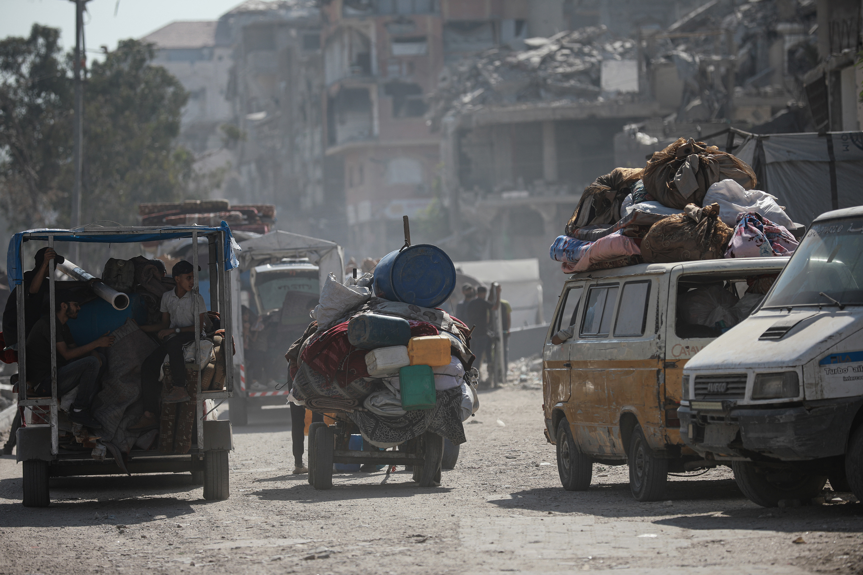 Palestinians flee Israel’s fierce bombardment of Gaza City