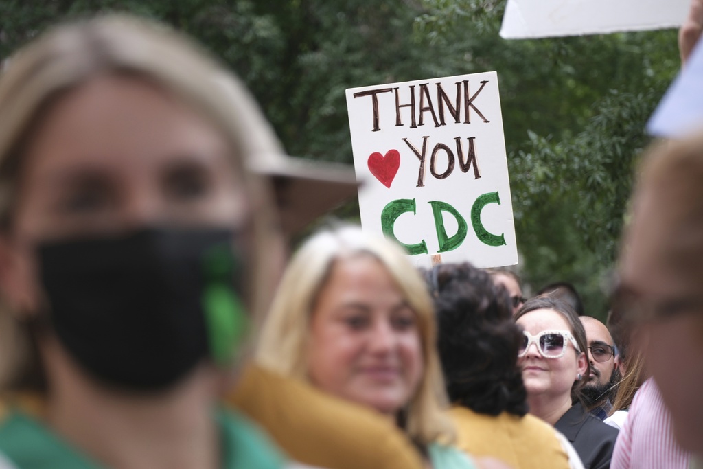 Supporters of the CDC demonstrate outside its headquarters