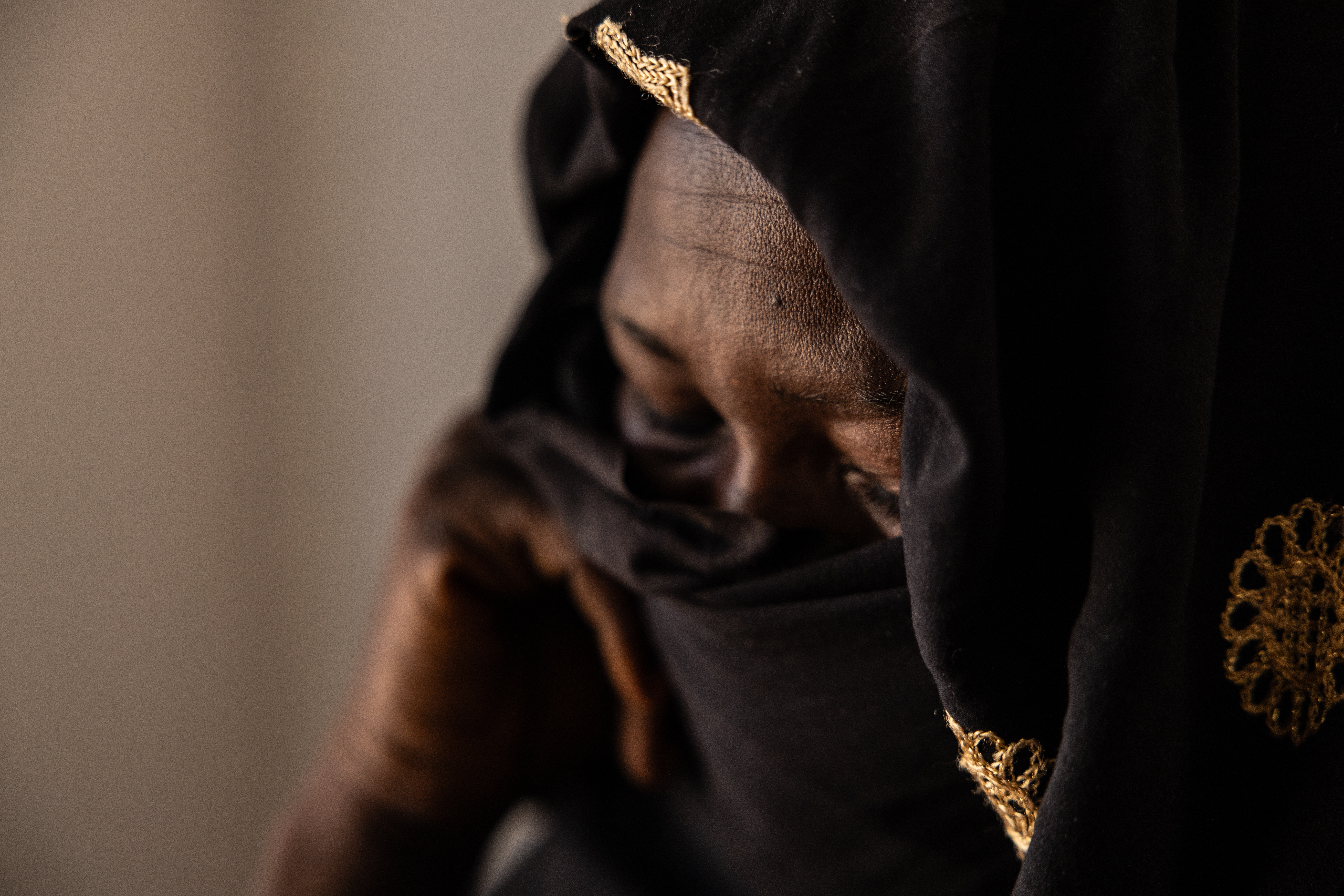Haway sits for a portrait at the UNICEF safe space in Adre. She was raped while collecting firewood the evening before. Caitlin Kelly