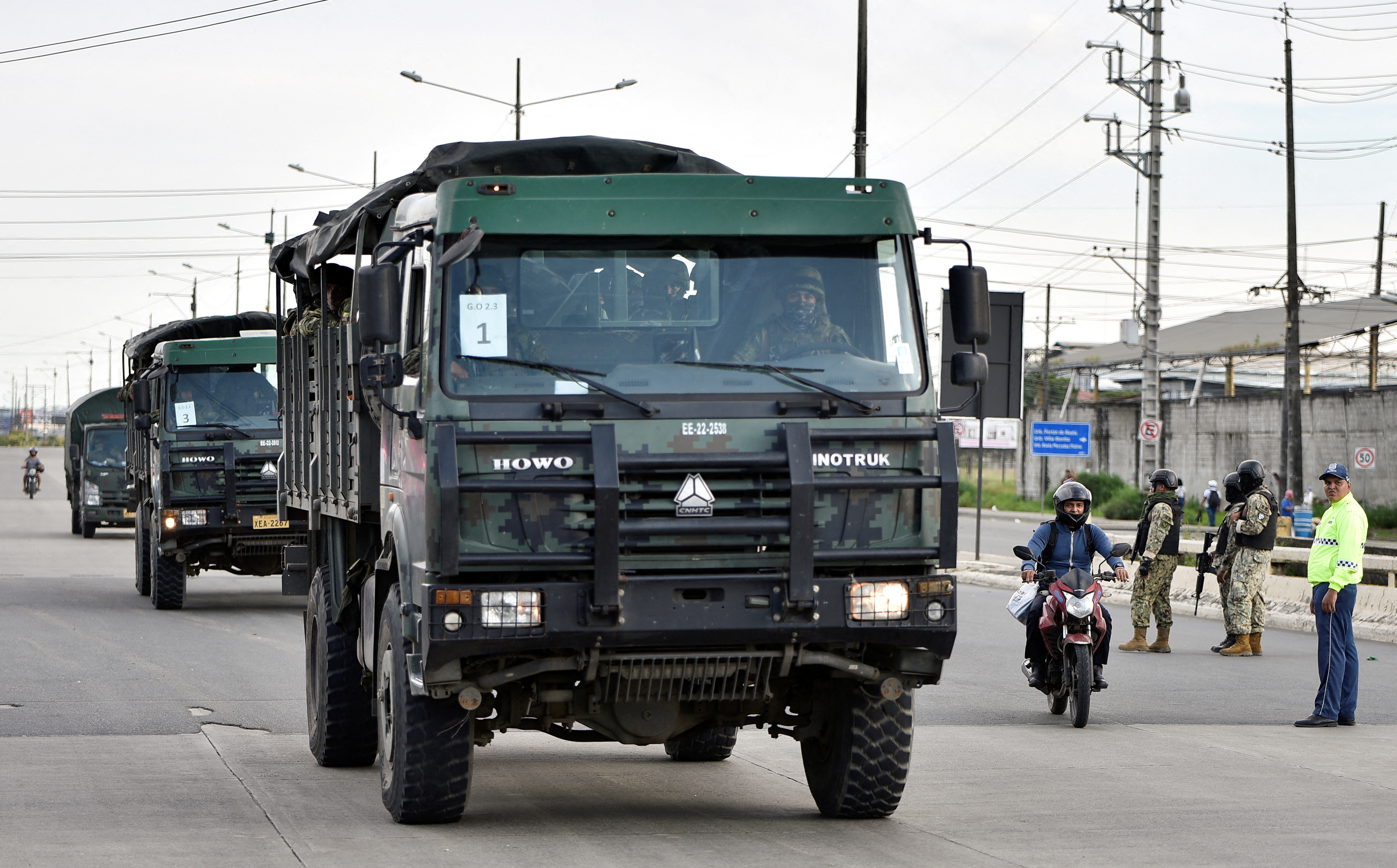 Security personnel arrive at the Penitenciaria del Litoral prison after a riot, in Guayaquil, Ecuador April 14, 2023 [Vicente Gaibor del Pino/Reuters]