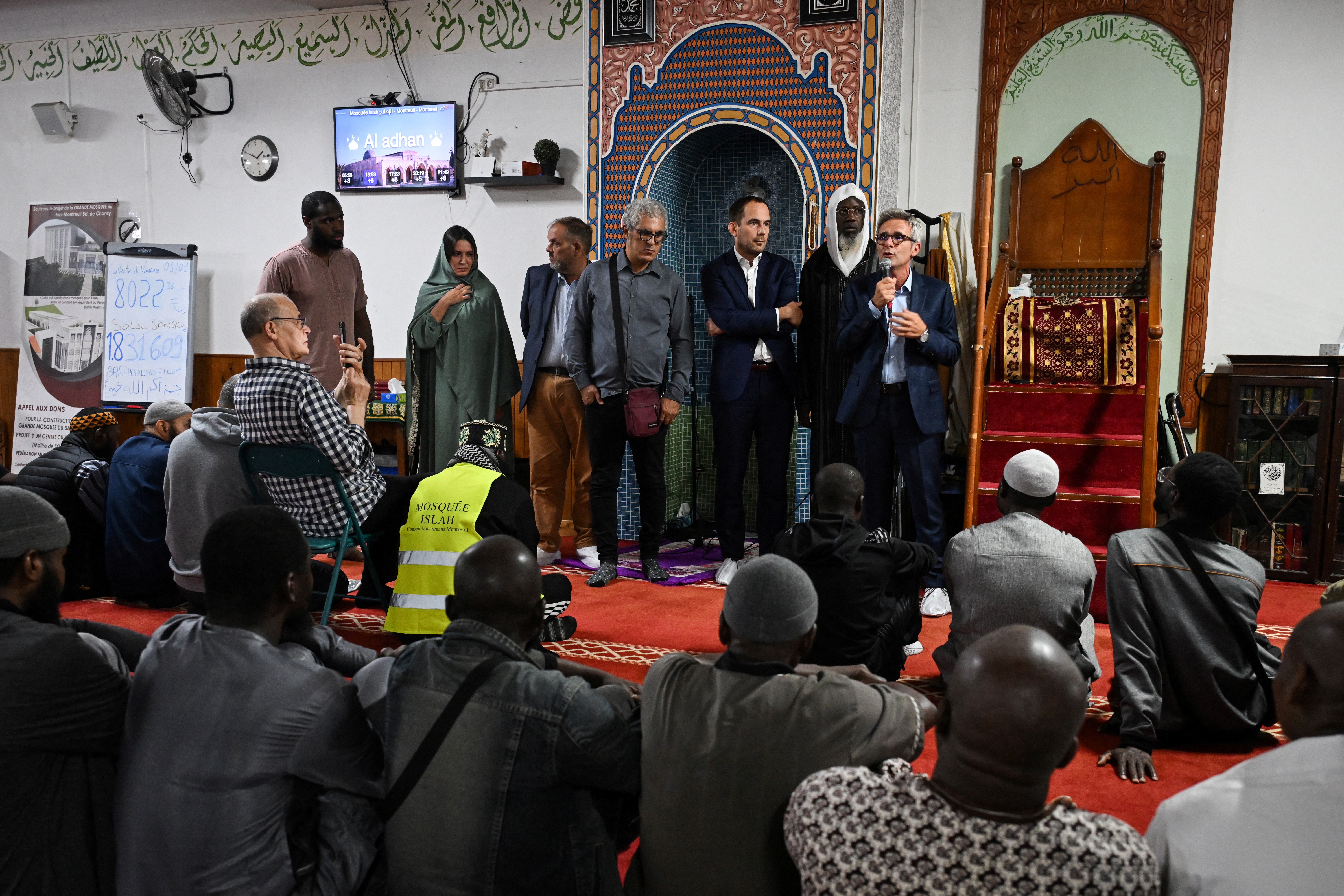 President the local council of the Seine-Saint-Denis department Stephane Troussel (R), flanked by Montreuil mayor Patrice Bessac (2nd R), speaks to faithfuls at the Mosque Islah following the discovery of pigs head, left at the entrance of the building earlier in the morning, in Montreuil, Seine-Saint-Denis, on the outskirts of Paris, on September 9, 2025. Pig heads, an animal considered impure in Islam, were found on September 9, 2025 in the morning in Paris in front of the entrance of the Islah mosque in Montreuil (Seine-Saint-Denis), as well as in Montrouge, Malakoff (Hauts-de-Seine) and Gentilly (Val-de-Marne), according to various sources. The Paris police prefect Laurent Nunez announced the immediate opening of an investigation. (Photo by Bertrand GUAY / AFP)