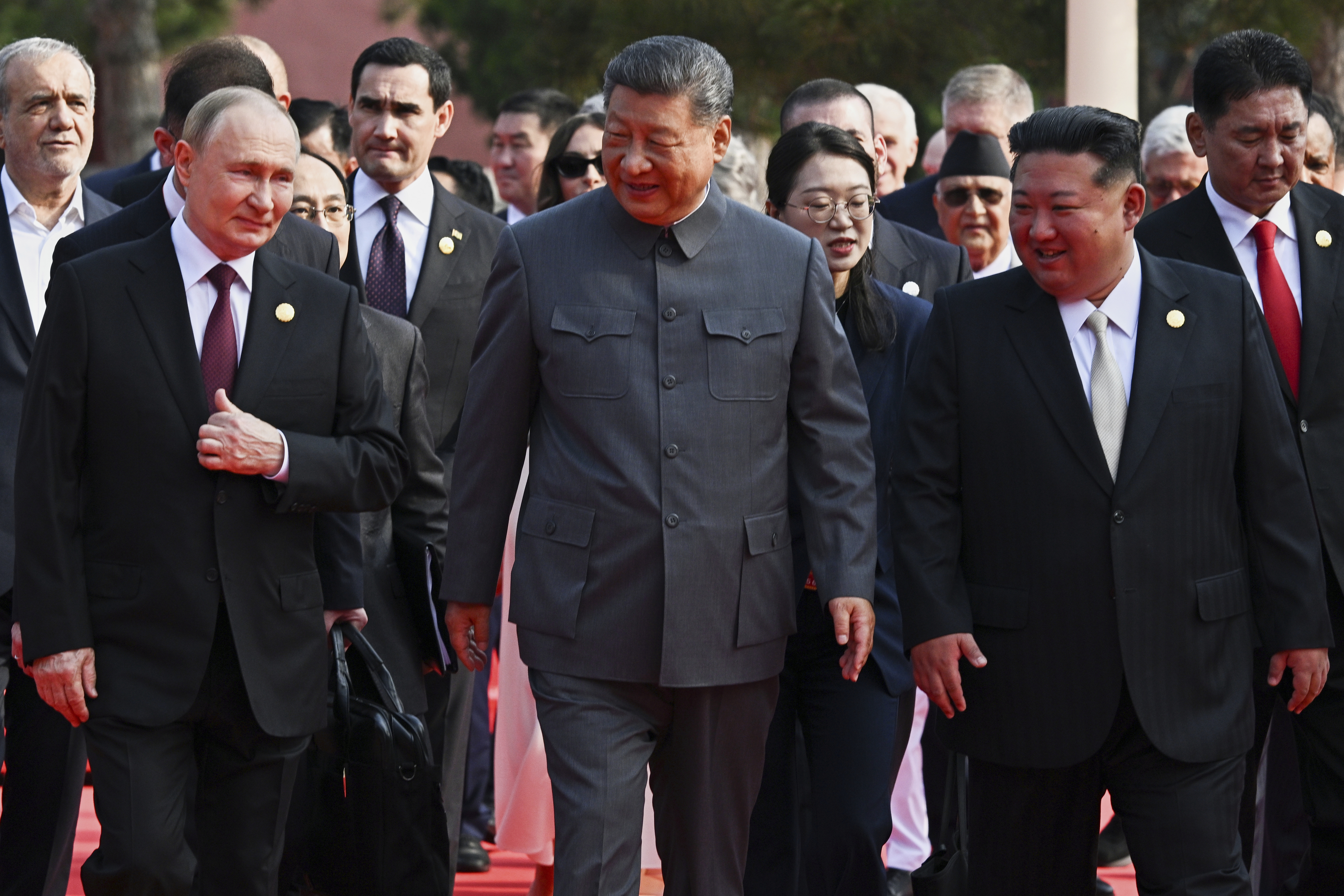 Front from left, Russian President Vladimir Putin, Chinese President Xi Jinping and North Korean leader Kim Jong Un arrive at a military parade to commemorate the 80th anniversary of Japan's World War II surrender in Beijing, China, Wednesday, Sept. 3, 2025. (Sergei Bobylev, Sputnik, Kremlin Pool Photo via AP)