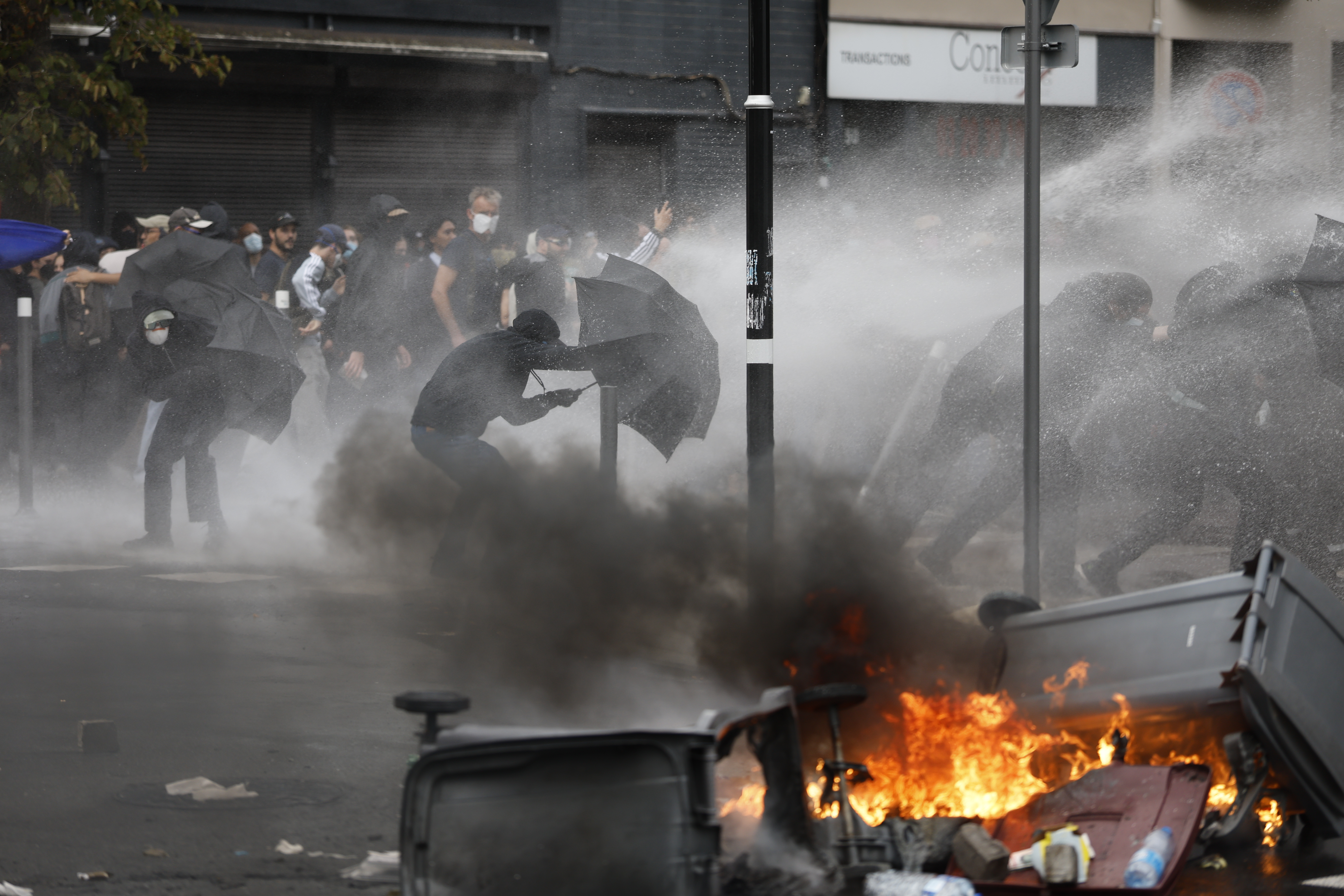 France's streets ablaze as anti-government protests paralyze daily life