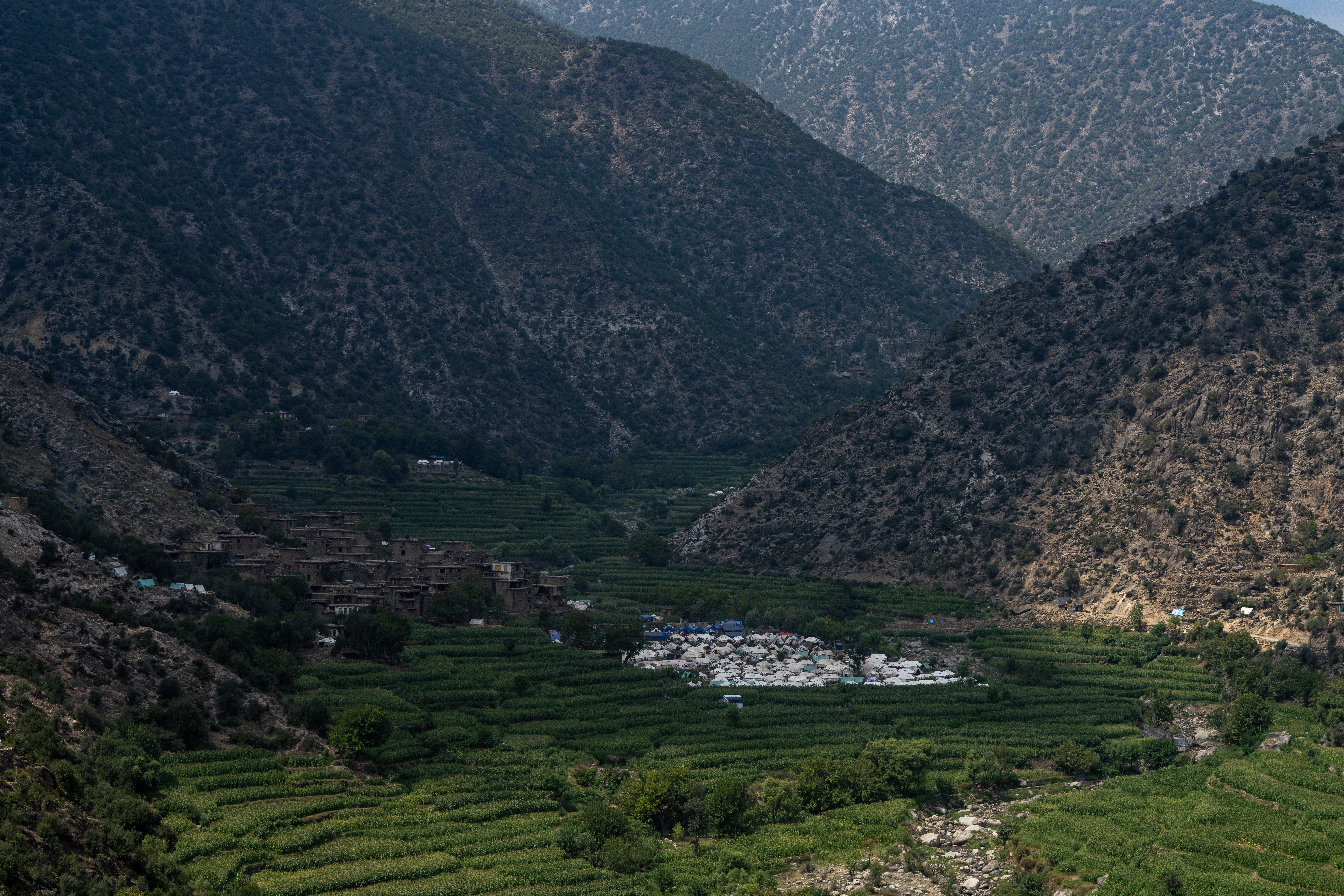 Andarlachak village and the camp that was set up on the fields next to the village