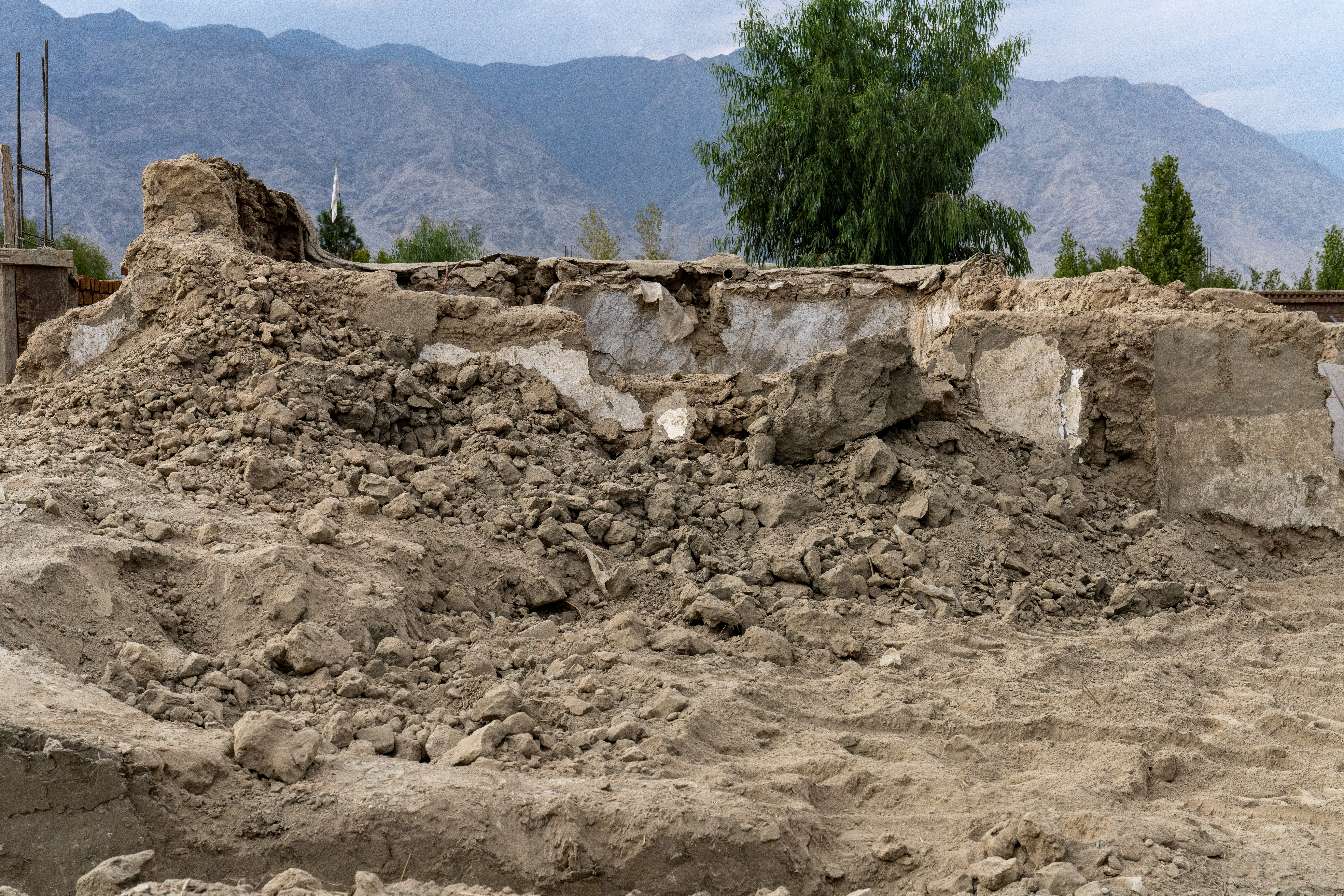 The destroyed mud brick house that 58-year-old Sadat Khan was renting in Barabat village [Sorin Furcoi/Al Jazeera]