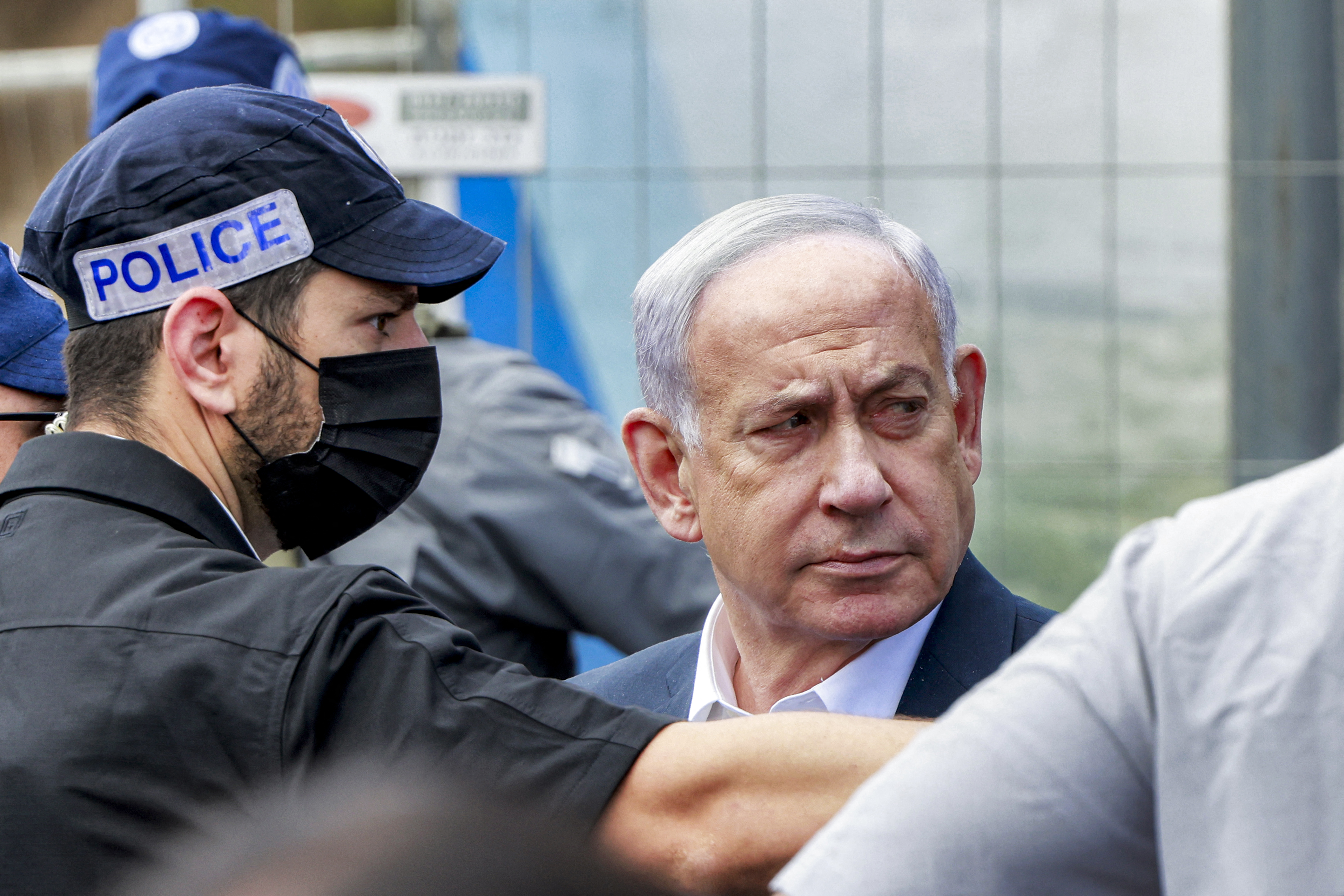 Israel's Prime Minister Benjamin Netanyahu visits the scene of a shooting at the Ramot road junction in Israeli-annexed east Jerusalem on September 8, 2025.