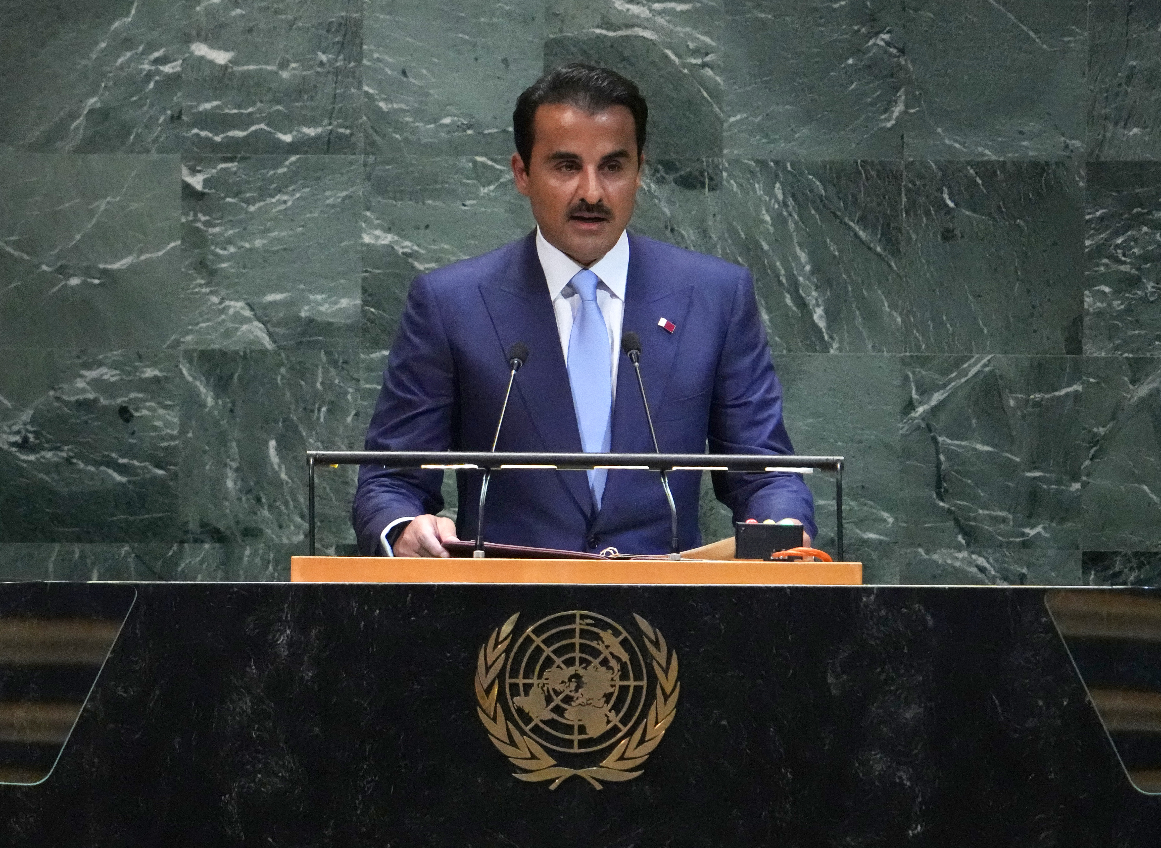 Qatar's Emir Sheikh Tamim bin Hamad al-Thani speaks during the General Debate of the United Nations General Assembly at the UN headquarters in New York City on September 23, 2025. (Photo by TIMOTHY A. CLARY / AFP)
