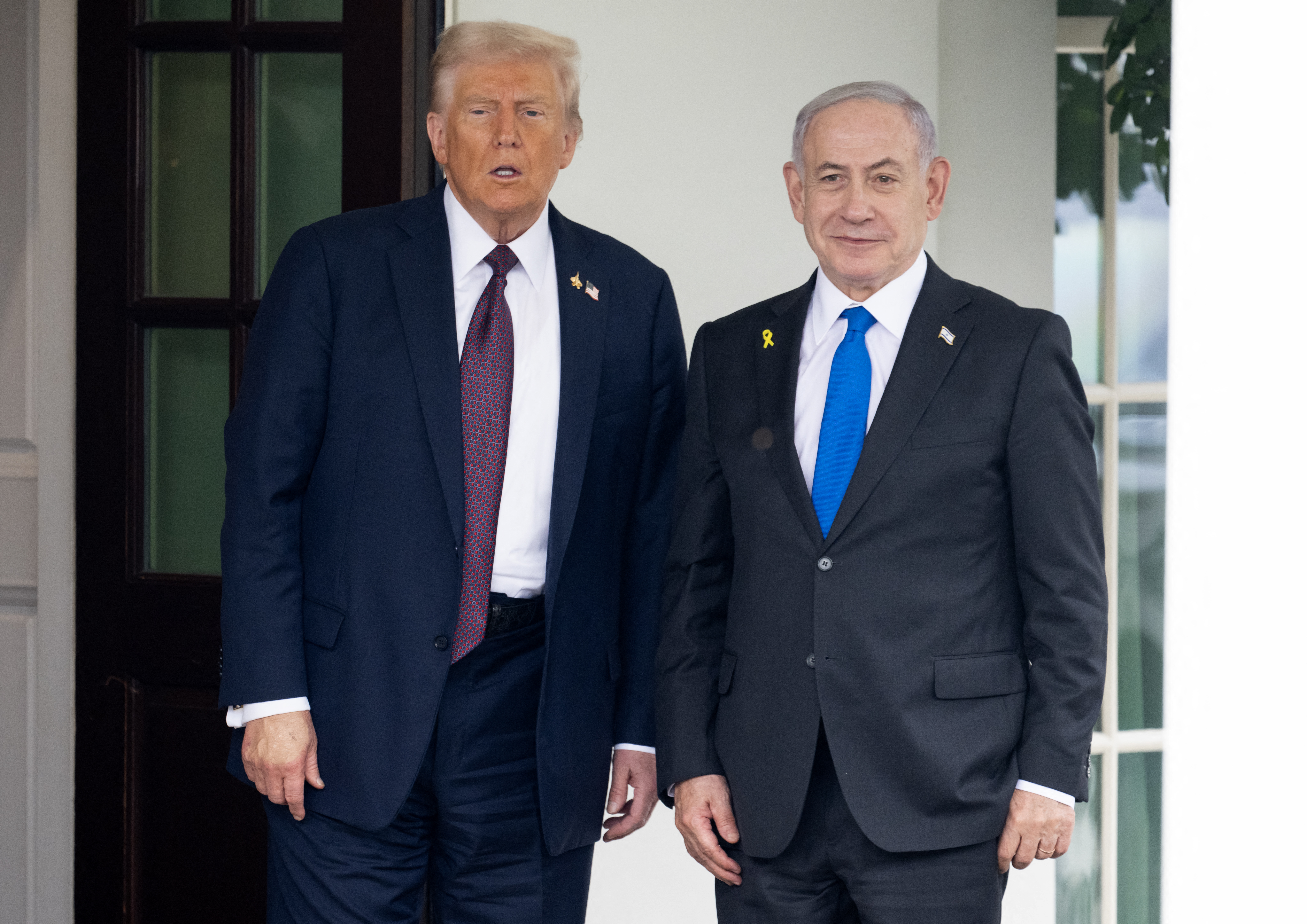 US President Donald Trump greets Israeli Prime Minister Benjamin Netanyahu as he arrives at the West Wing of the White House in Washington, DC on September 29, 2025. [Kevin Lamarque/Reuters]