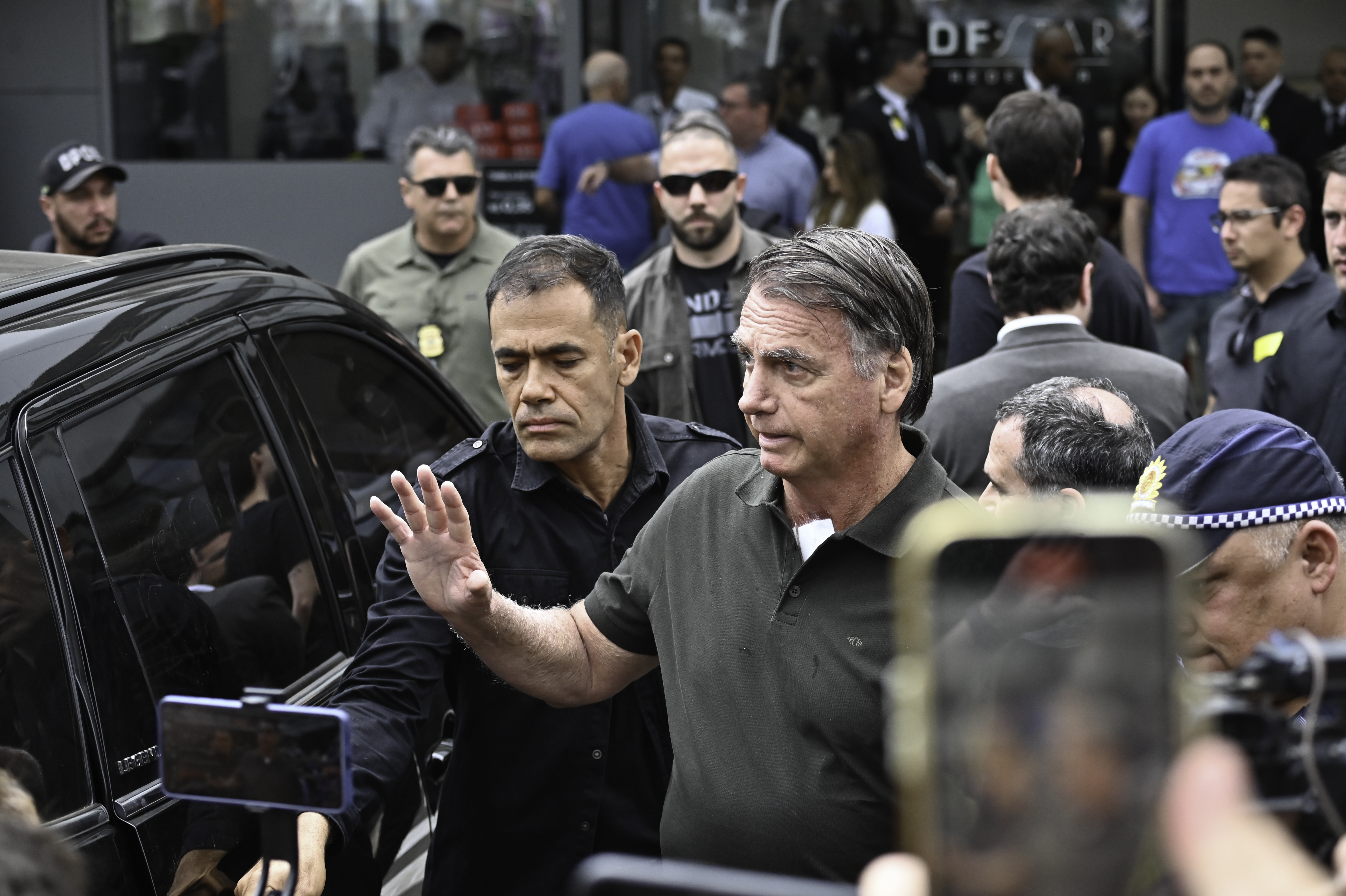 BRASILIA, BRAZIL - SEPTEMBER 14: Former Brazilian President Jair Bolsonaro leaves DF Star Hospital after undergoing a medical procedure on September 14, 2025, in Brasília, Brazil. Bolsonaro ruled the country from 2019 to 2022 and was sentenced to 27 years in prison for a coup plot after his defeat to Lula da Silva in the 2022 presidential election. The right-wing former president also faces four additional charges related to attacks on democratic order. (Photo by Ton Molina/Getty Images)