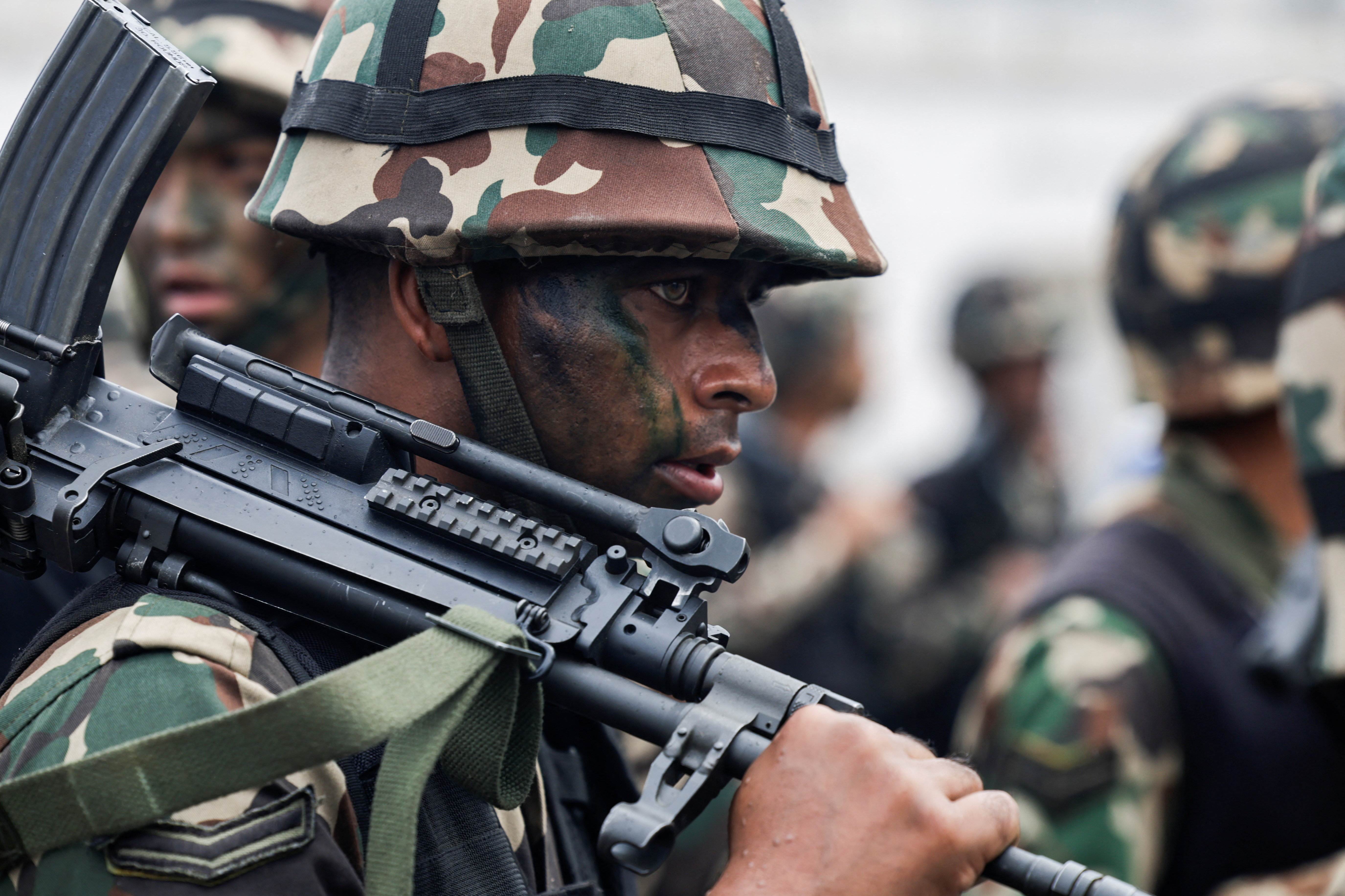 Nepali army soldiers patrol.