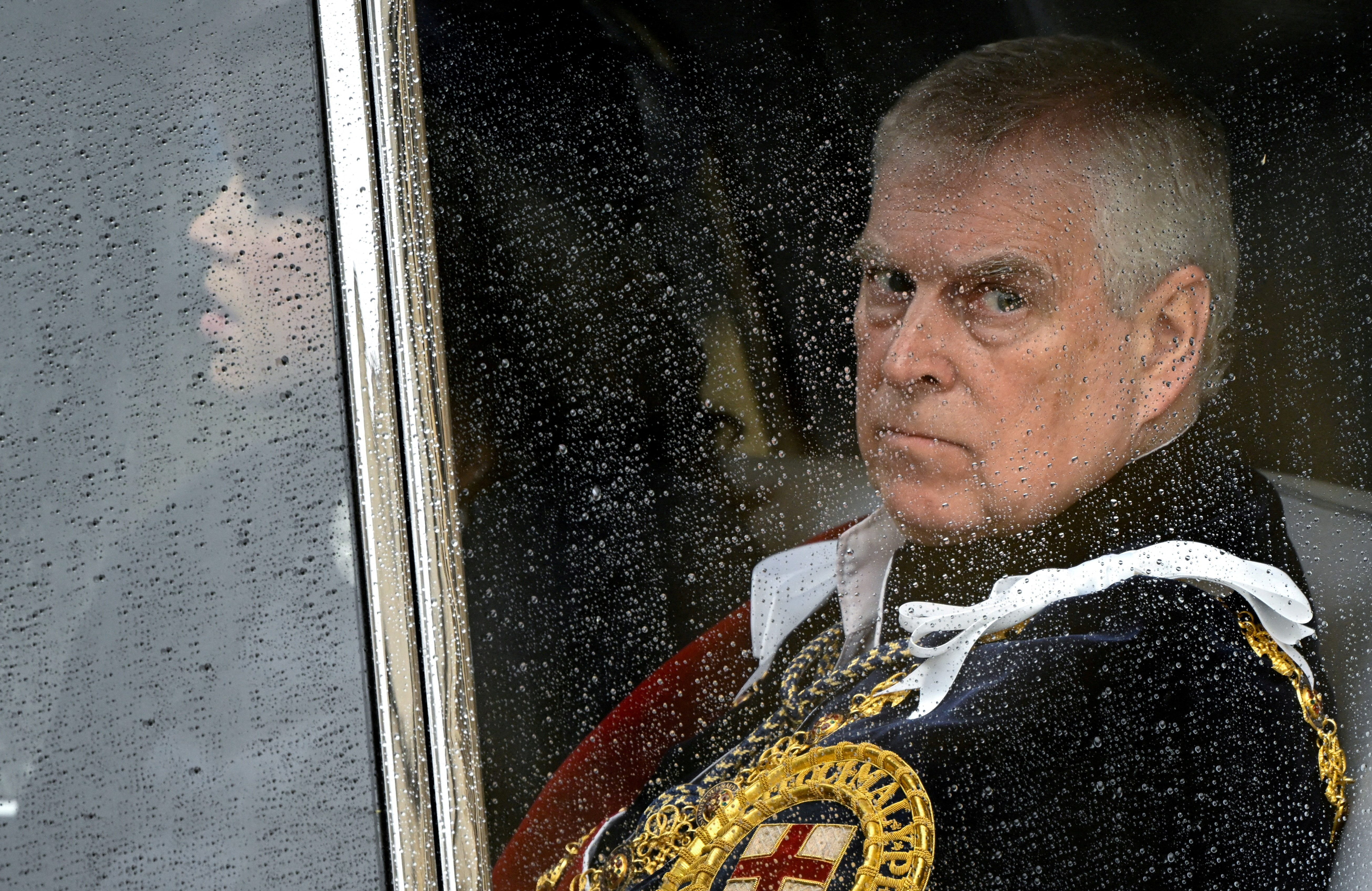UK's Prince Andrew in a car.