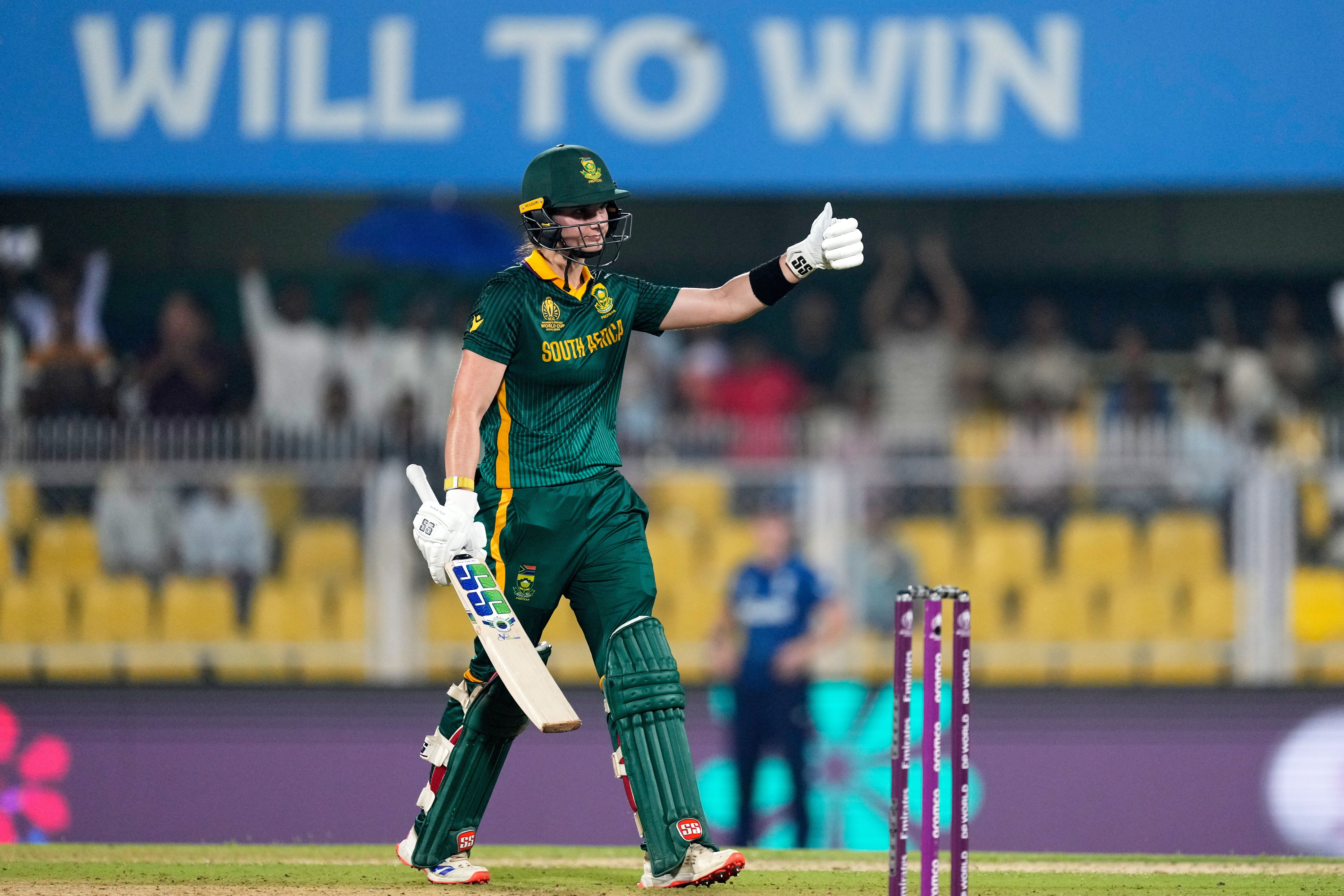 South Africa's captain Laura Wolvaardt celebrates one hundred and fifty runs during the ICC Women's Cricket World Cup first semifinal match between England and South Africa at Barsapara Cricket Stadium in Guwahati, India, Thursday, Oct. 29, 2025. (AP Photo/Anupam Nath)