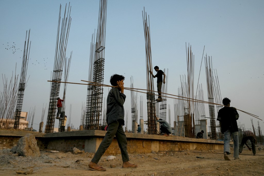 Labourers work at the Mahatma Gandhi Ashram redevelopment site in Ahmedabad on November 20, 2025. [File: Shammi Mehra/AFP]