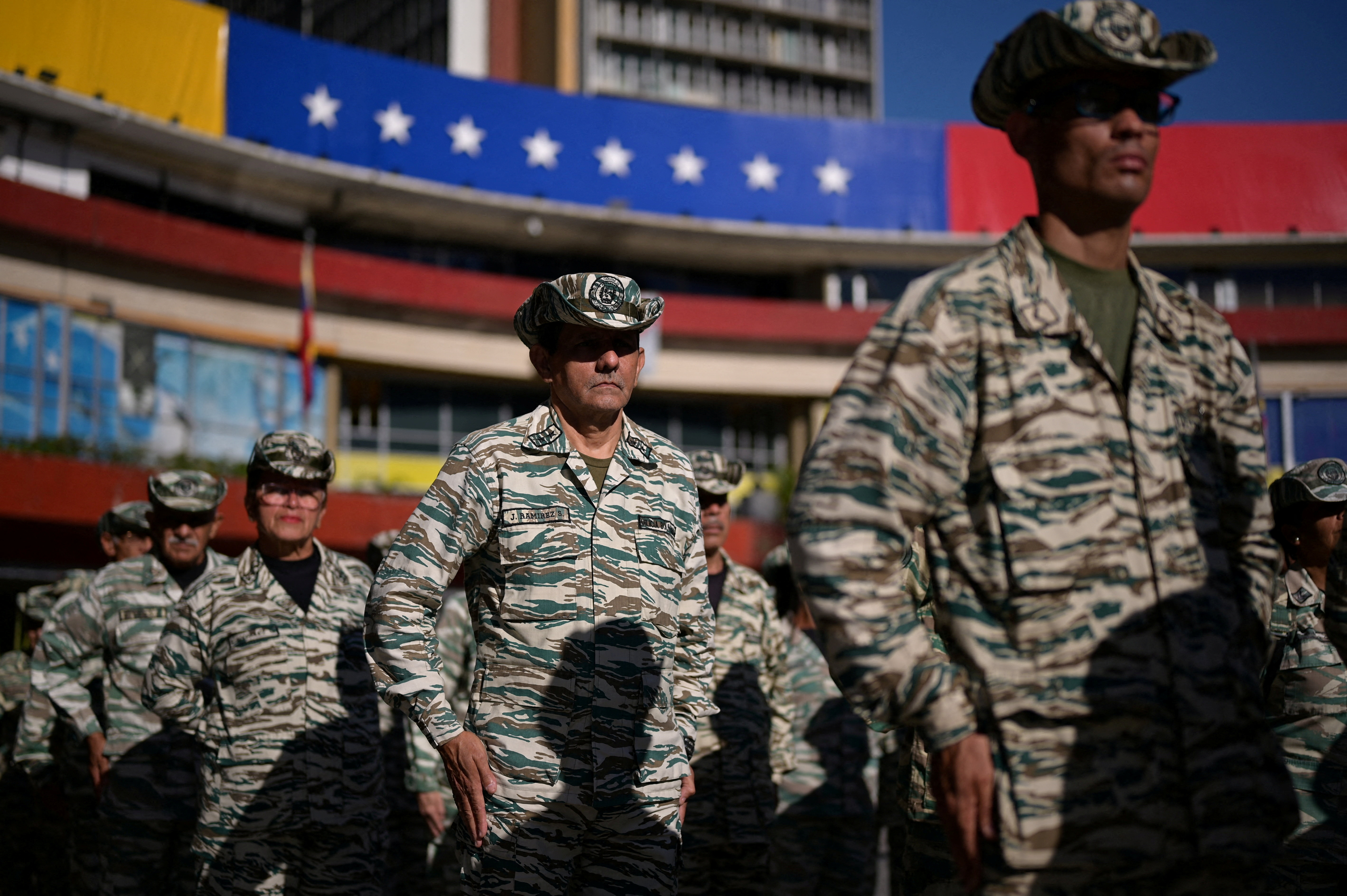 Members of the Bolivarian Militia stand in formation during a military training