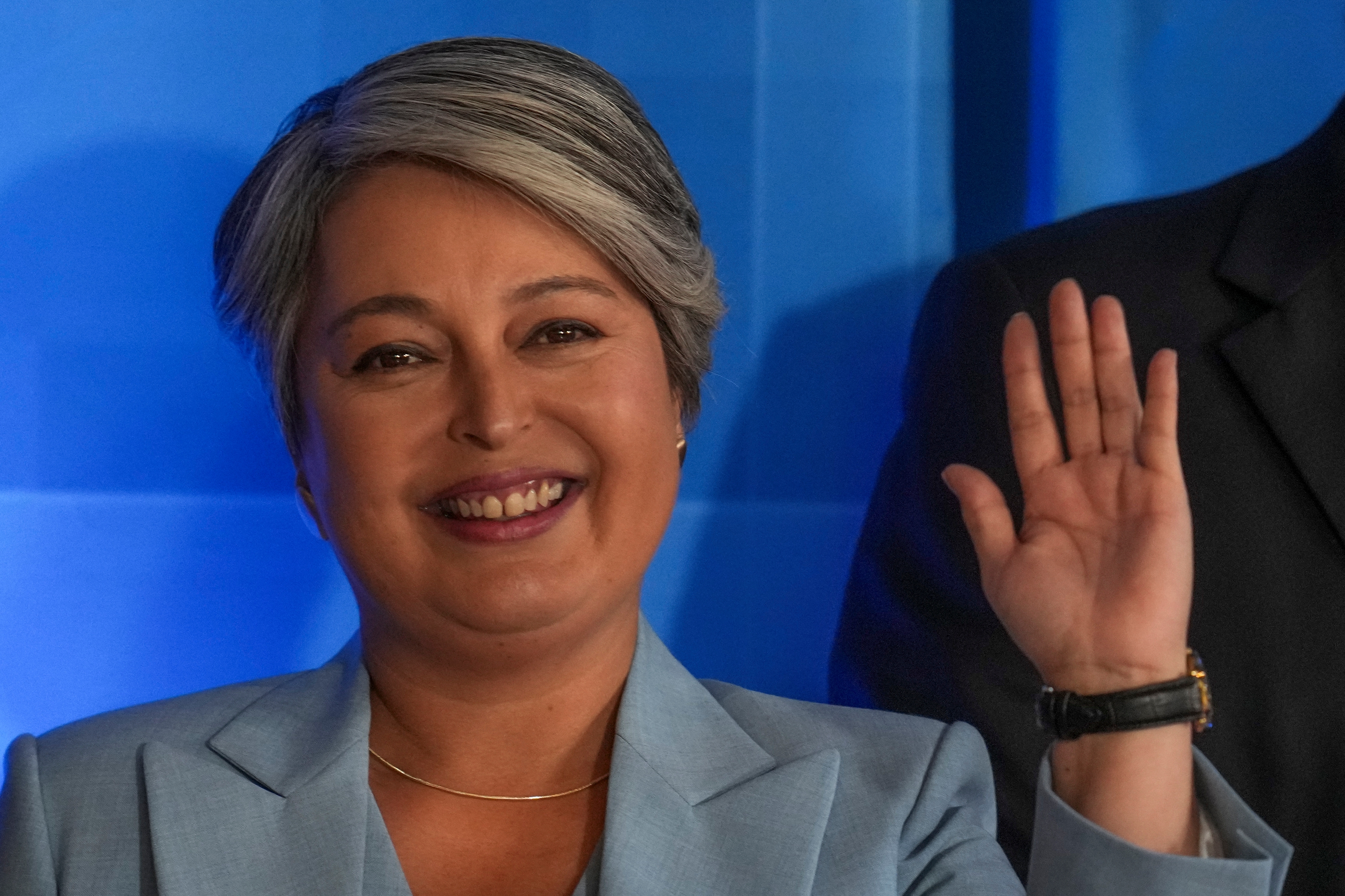 Presidential candidate Jeannette Jara of the Unidad por Chile coalition waves prior to a debate ahead of general elections, in Santiago, Chile, Monday, Nov. 10, 2025. (AP Photo/Esteban Felix)