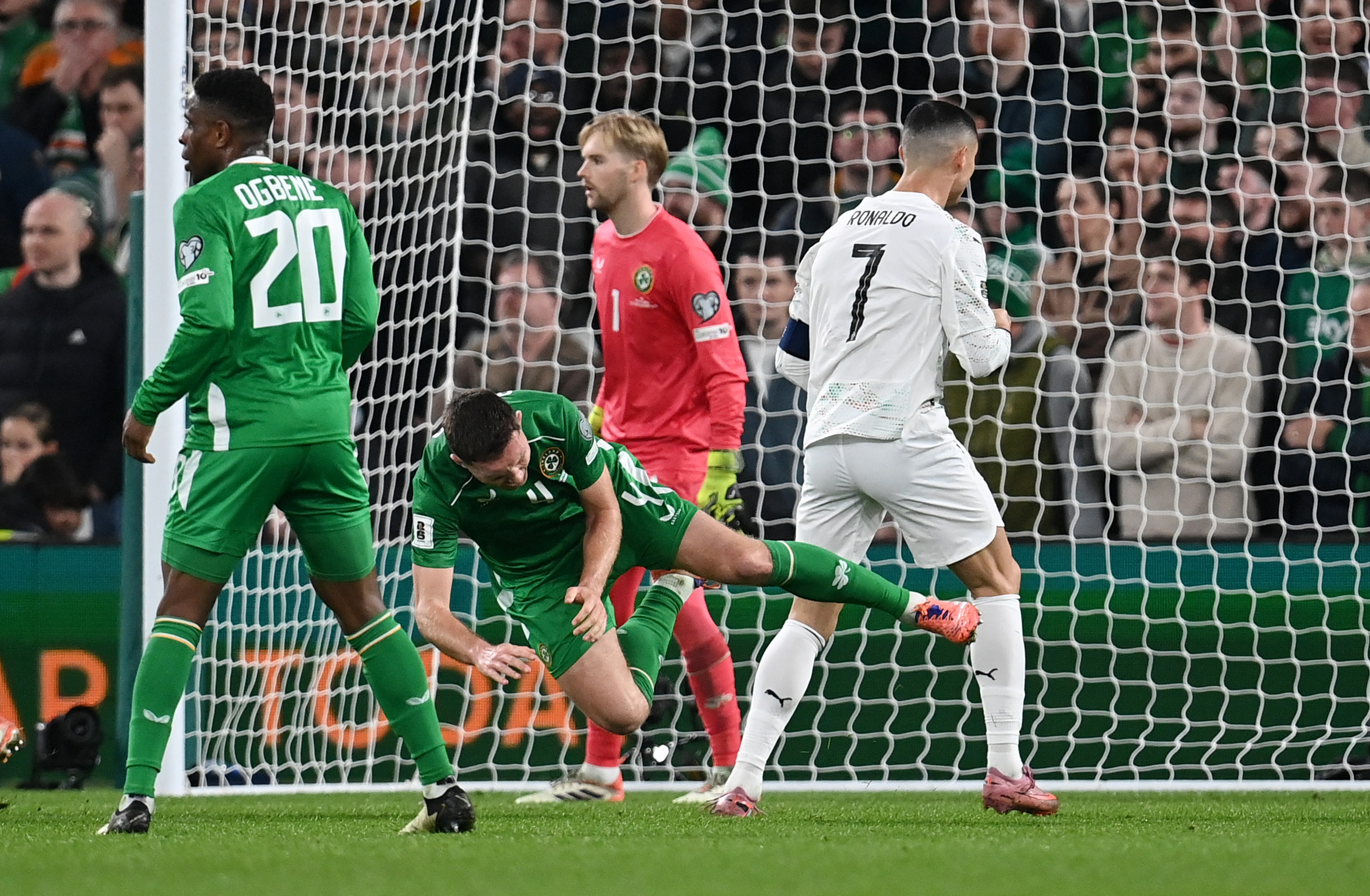 DUBLIN, IRELAND - NOVEMBER 13: Dara O'Shea of Republic of Ireland reacts after being fouled by Cristiano Ronaldo of Portugal during the FIFA World Cup 2026 qualifier match between Republic of Ireland and Portugal at Aviva Stadium on November 13, 2025 in Dublin, Ireland. (Photo by Charles McQuillan/Getty Images)