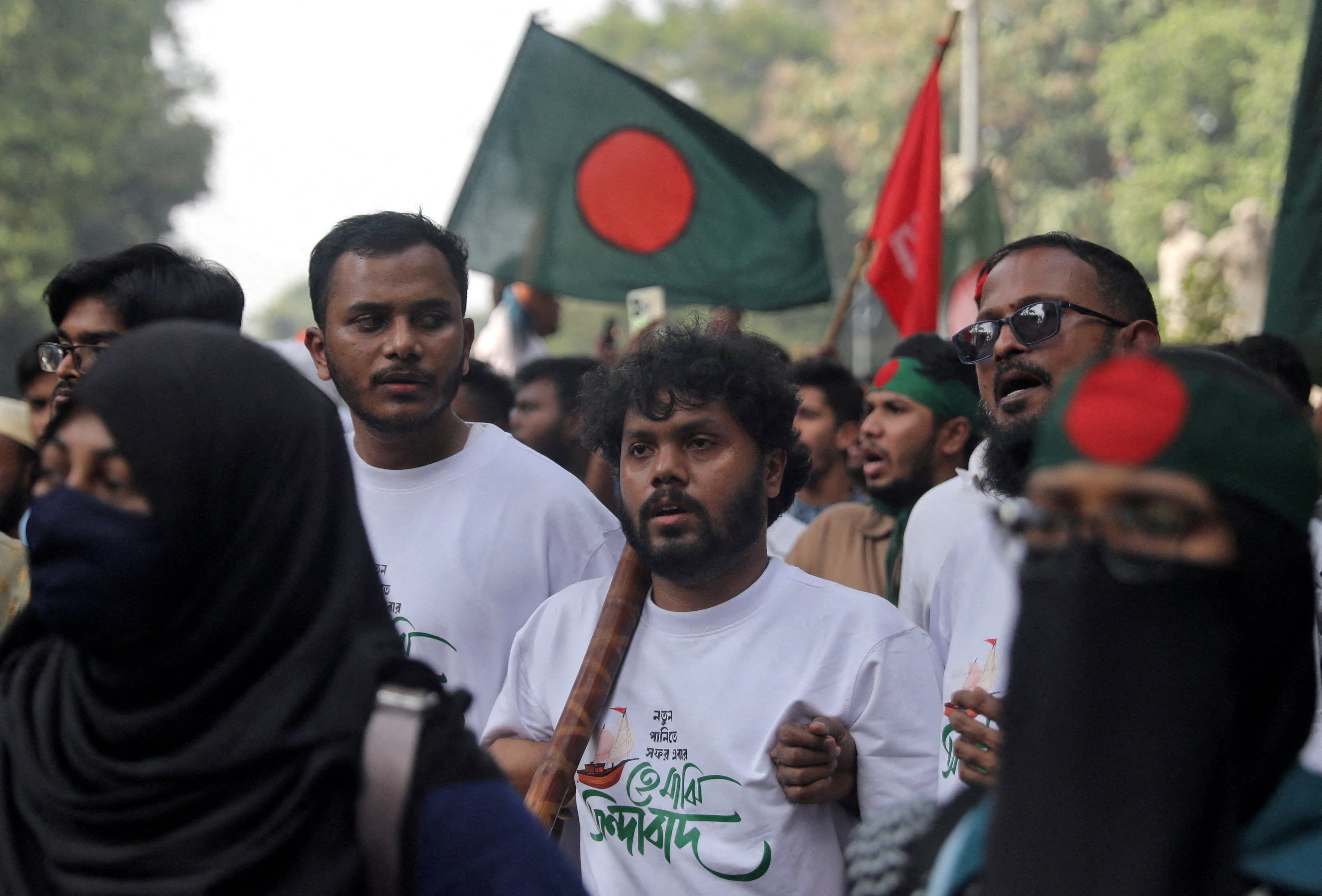 Sharif Osman Hadi, along with other demonstrators, takes part in a protest.