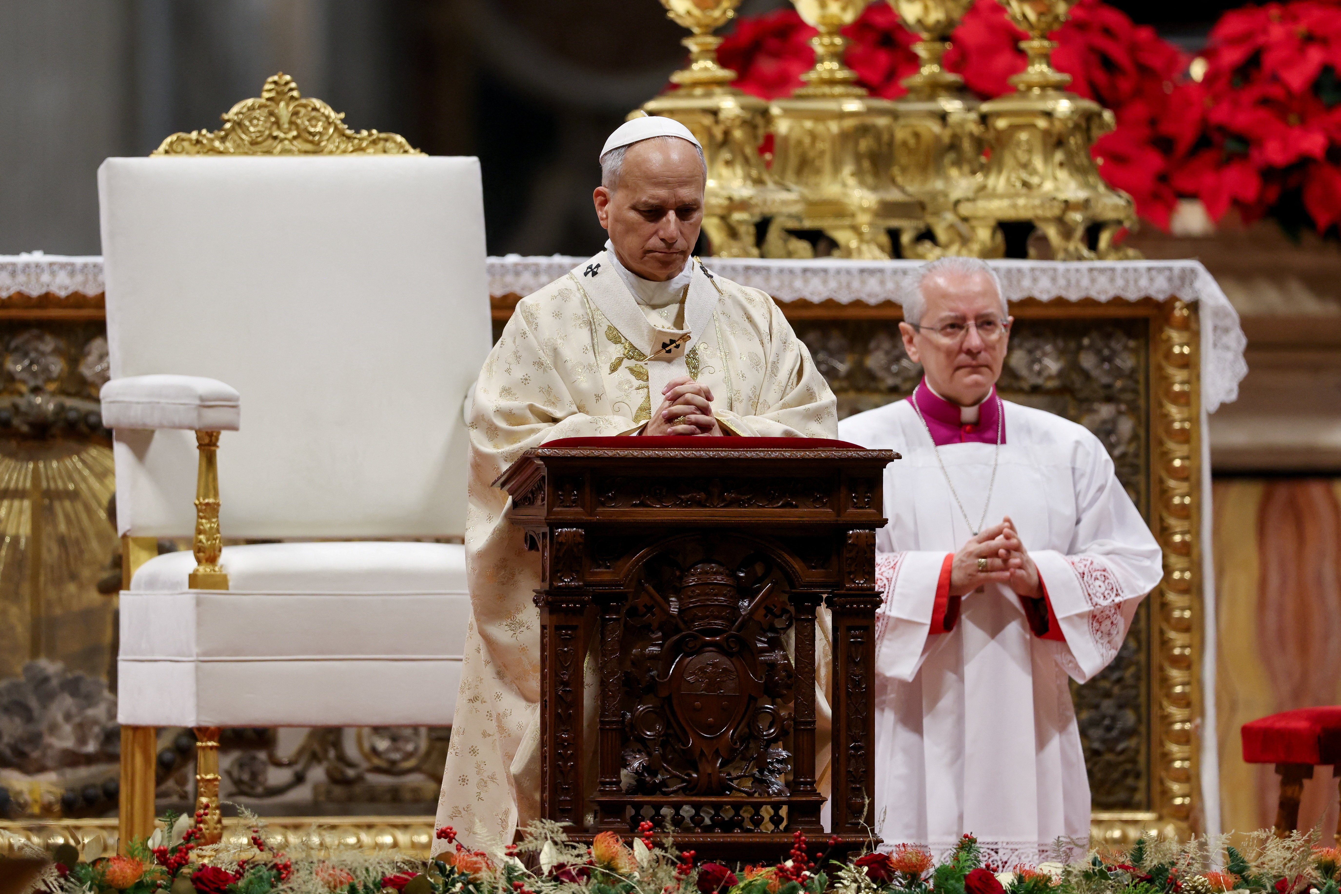 Pope Leo XIV performs the Christmas mass at St Peter's Basilica in the Vatican.