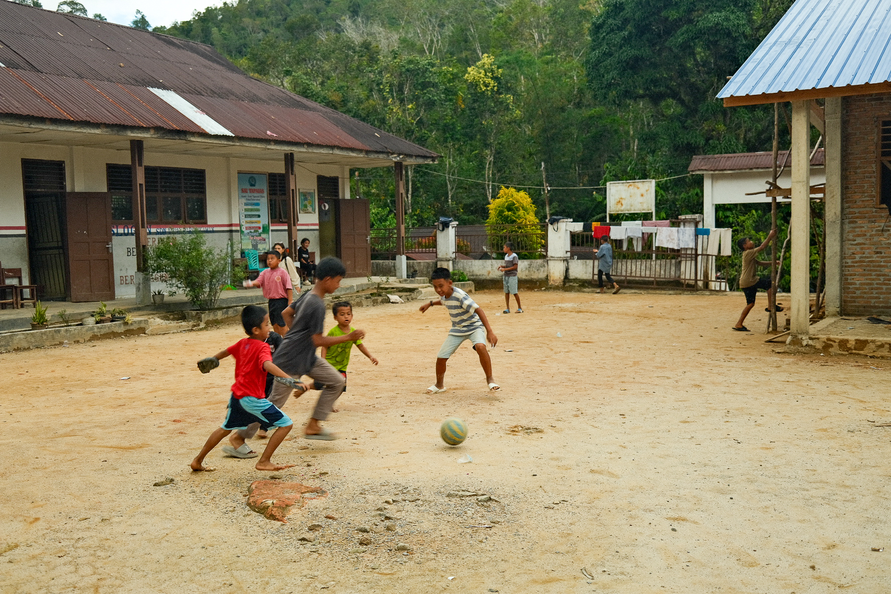 With no school in session for the children displaced by the disasters, they have found their own ways to pass the time.