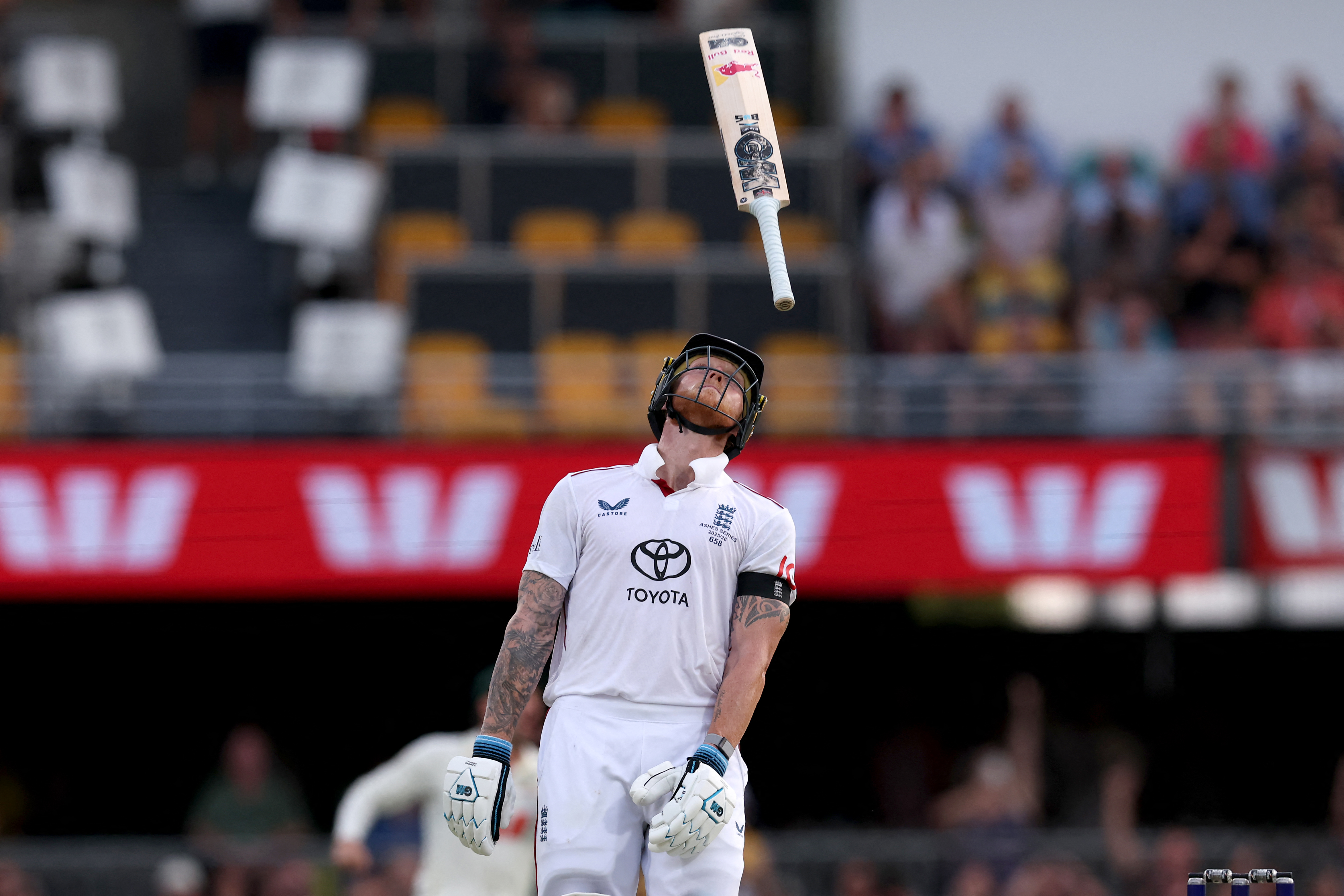 England's captain Ben Stokes throws his bat after being dismissed.
