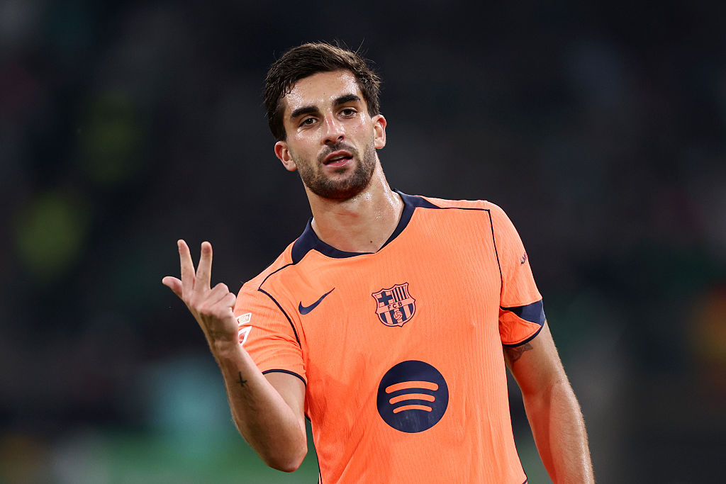 Ferran Torres of FC Barcelona celebrates scoring his team's fourth goal, completing his hat-trick