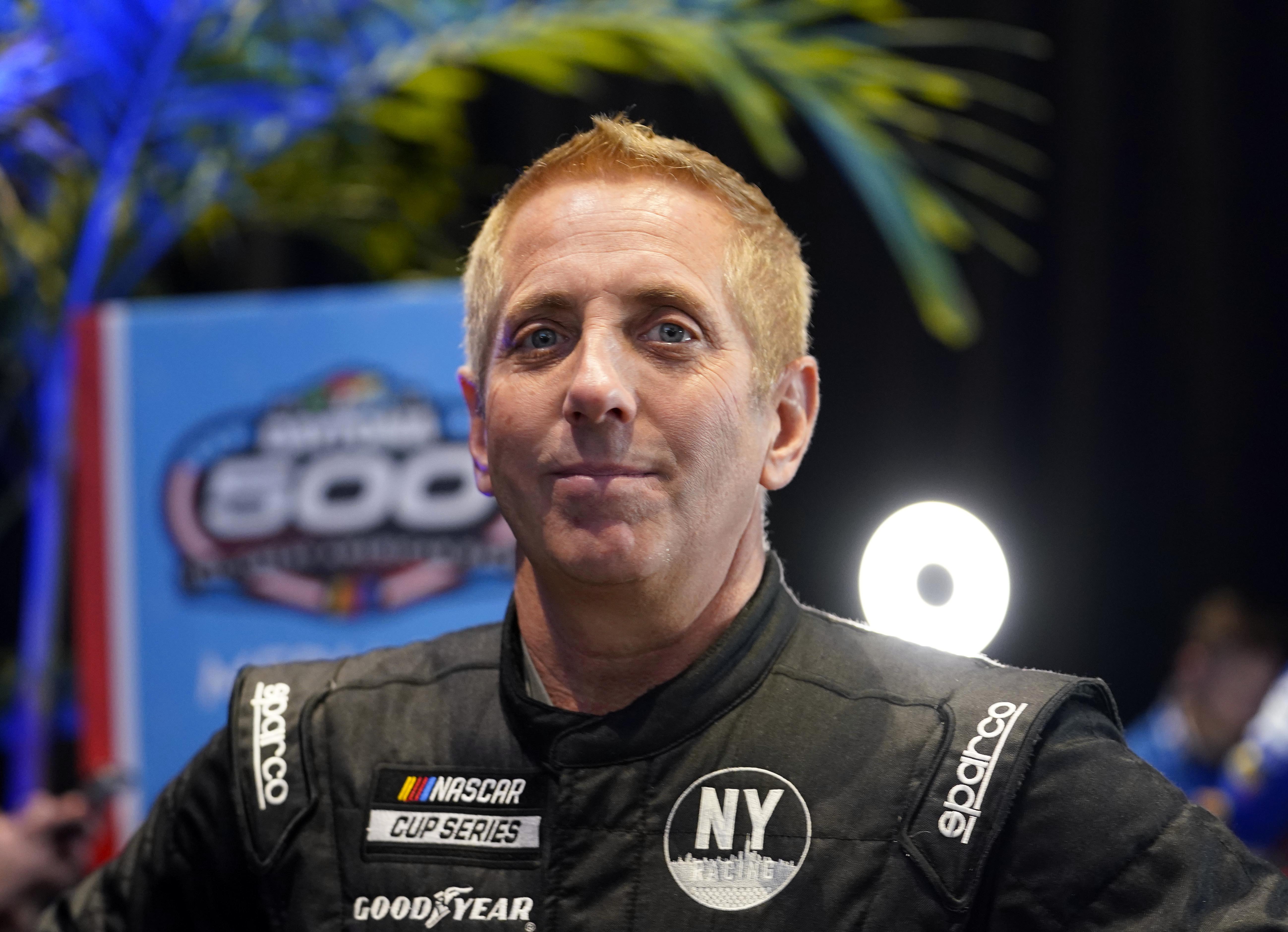 Feb 16, 2022; Daytona, FL, USA; Feb 16, 2022; Daytona, FL, USA; NASCAR Cup Series driver Greg Biffle (44) talks to the press during Daytona 500 media day at Daytona International Speedway. Mandatory Credit:Mandatory Credit: Mike Dinovo-USA TODAY Sports