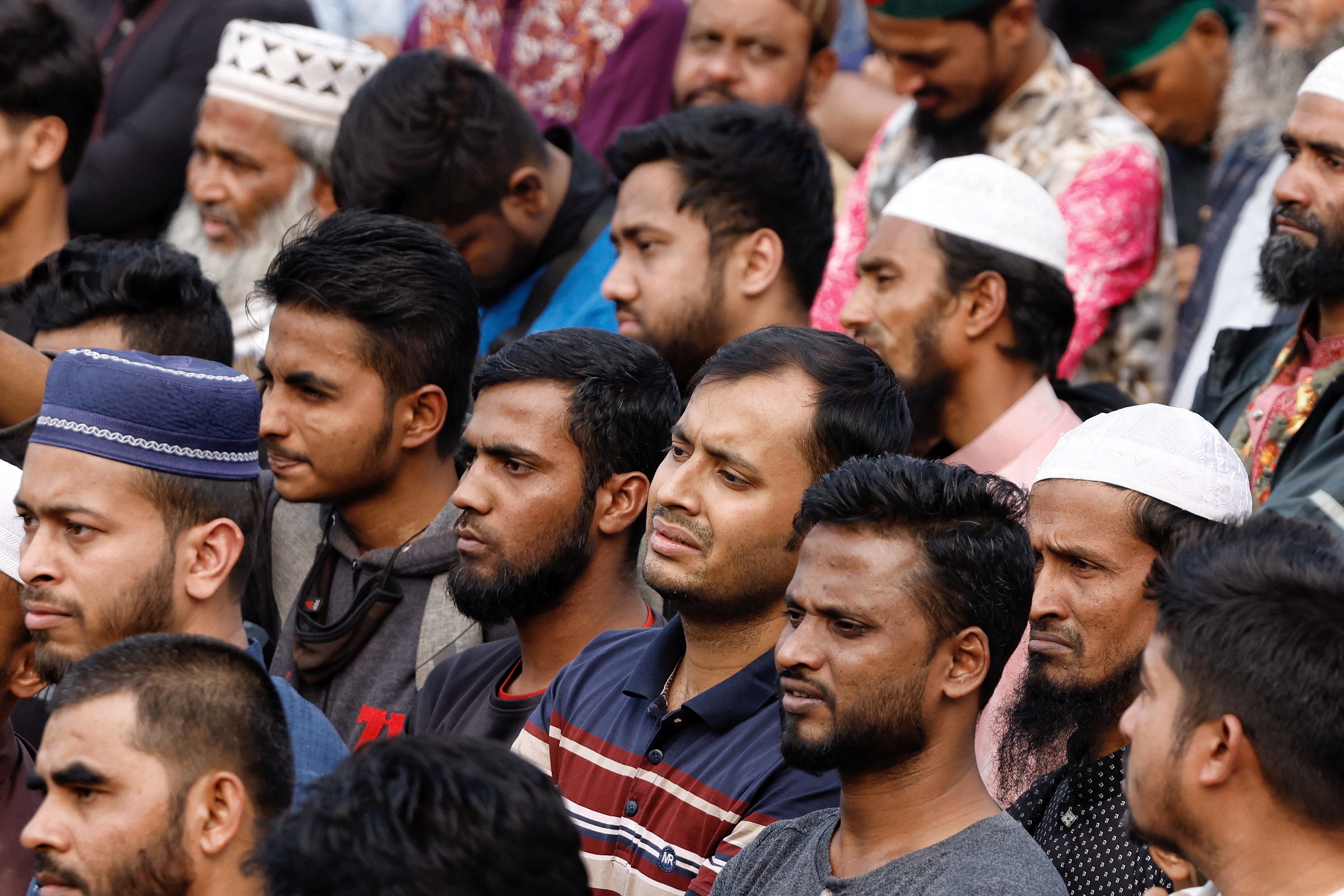 People mourn as they join the funeral prayer for Sharif Osman Hadi, a student leader, who died after being shot in the head, at the Parliament building area of Manik Mia Avenue, in Dhaka, Bangladesh, December 20, 2025. REUTERS/Mohammad Ponir Hossain